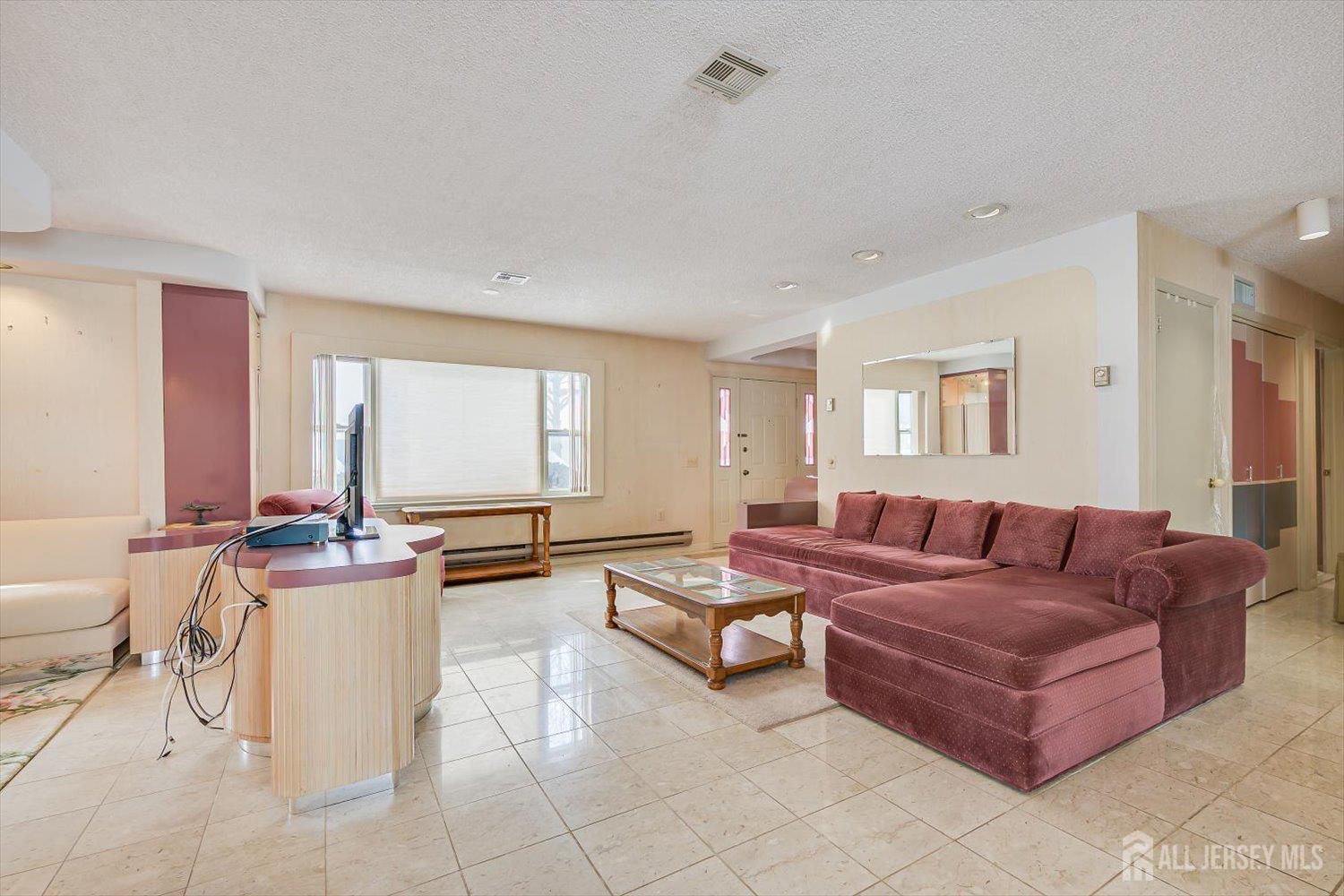 628A Windsor Way, Unit B Monroe Township, NJ 08831 - Photo 10 of 50 a living room with furniture and view of living room