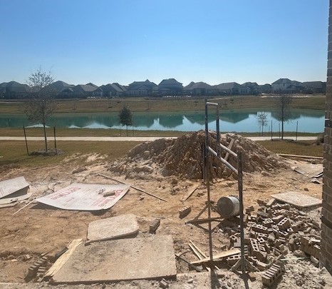 26239 Prairie Delight Place Hockley, TX 77447 - Photo 7 of 7 a view of a lake with a mountain