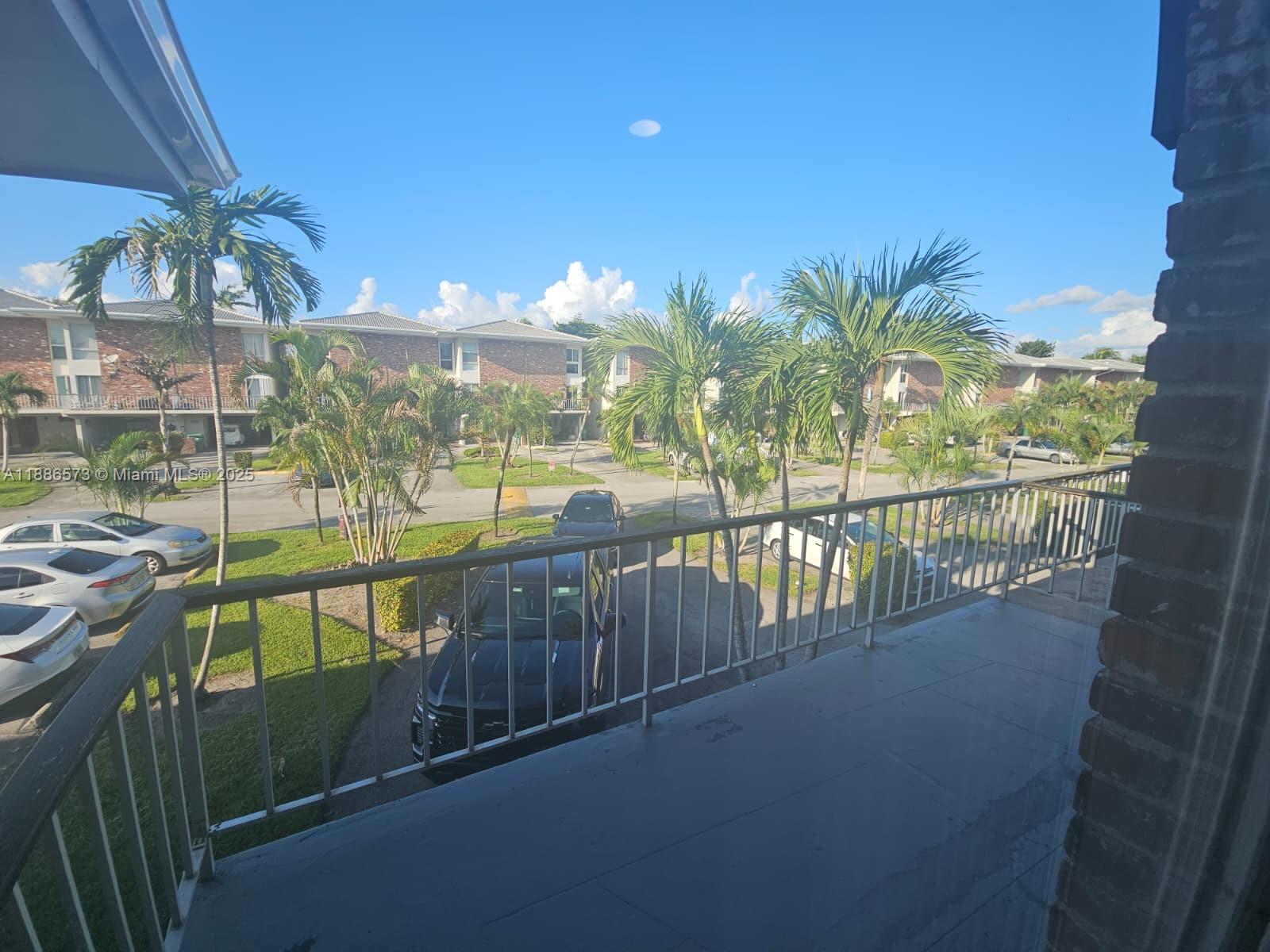 6782 Brookline Drive, Unit 6782 Hialeah, FL 33015 - Photo 15 of 27 a view of a balcony