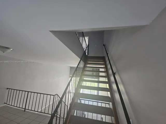 a view of entryway with stairs