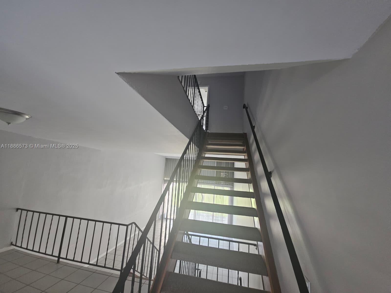 6782 Brookline Drive, Unit 6782 Hialeah, FL 33015 - Photo 16 of 27 a view of entryway with stairs