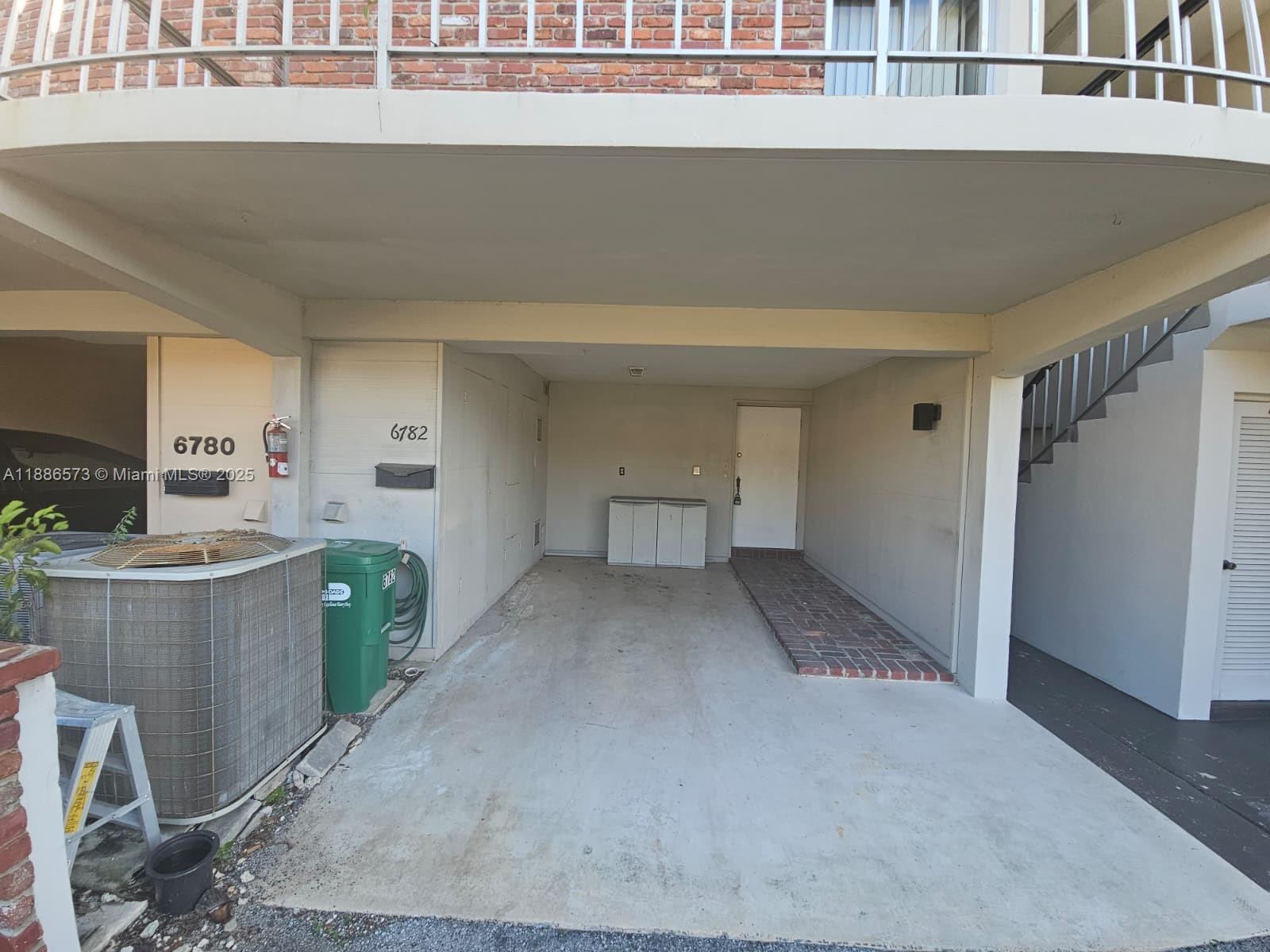 6782 Brookline Drive, Unit 6782 Hialeah, FL 33015 - Photo 5 of 27 a view of a kitchen with furniture and window