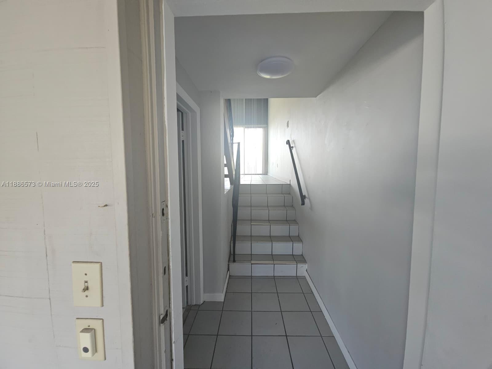 6782 Brookline Drive, Unit 6782 Hialeah, FL 33015 - Photo 9 of 27 wooden floor in a gallery