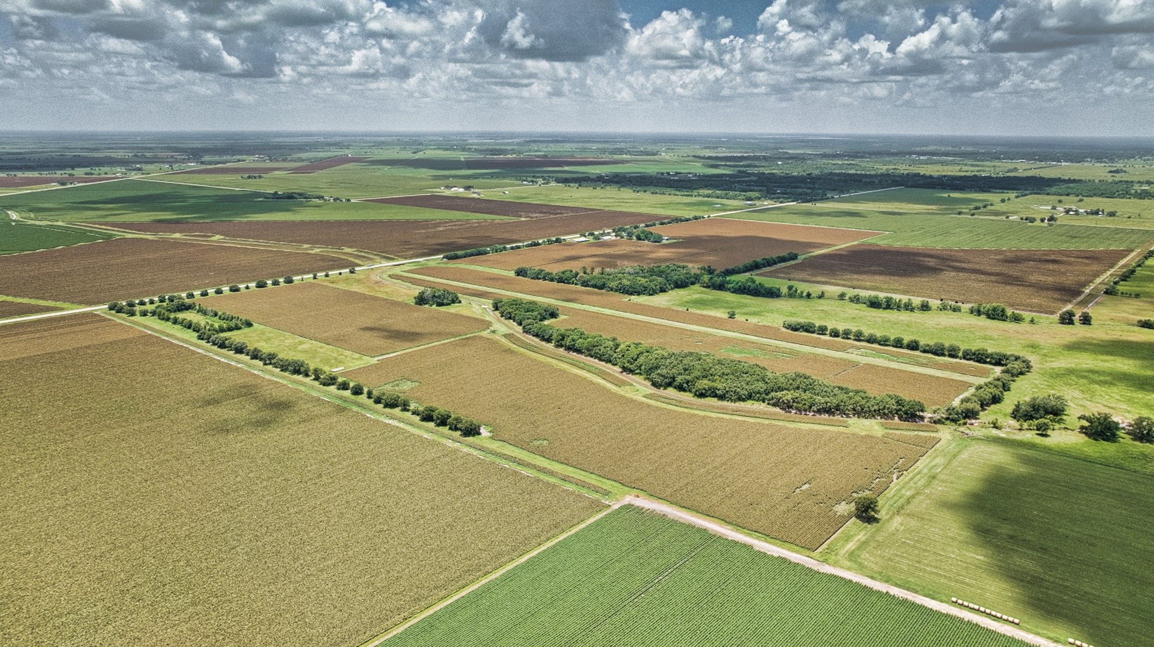 1462 Rd Damon Tx 77430 Road Damon, TX 77430 - Photo 22 of 22 a view of an outdoor space and tennis court