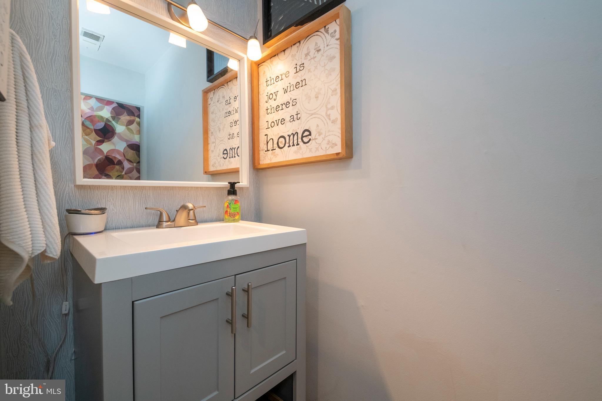 5469 Princess Drive Rosedale, MD 21237 - Photo 13 of 45 Updated half bathroom