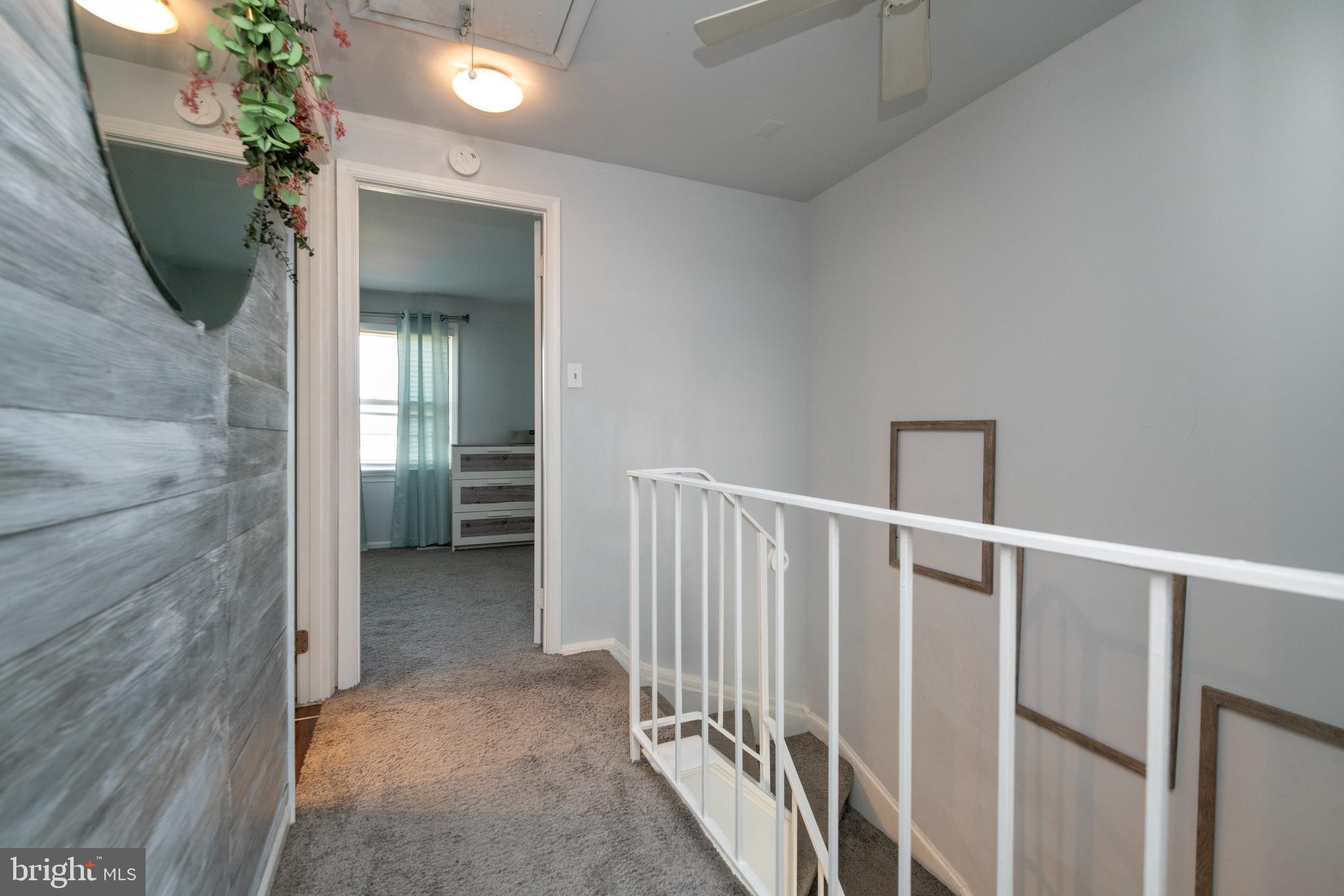 5469 Princess Drive Rosedale, MD 21237 - Photo 22 of 45 Hall in upper floor with natural light