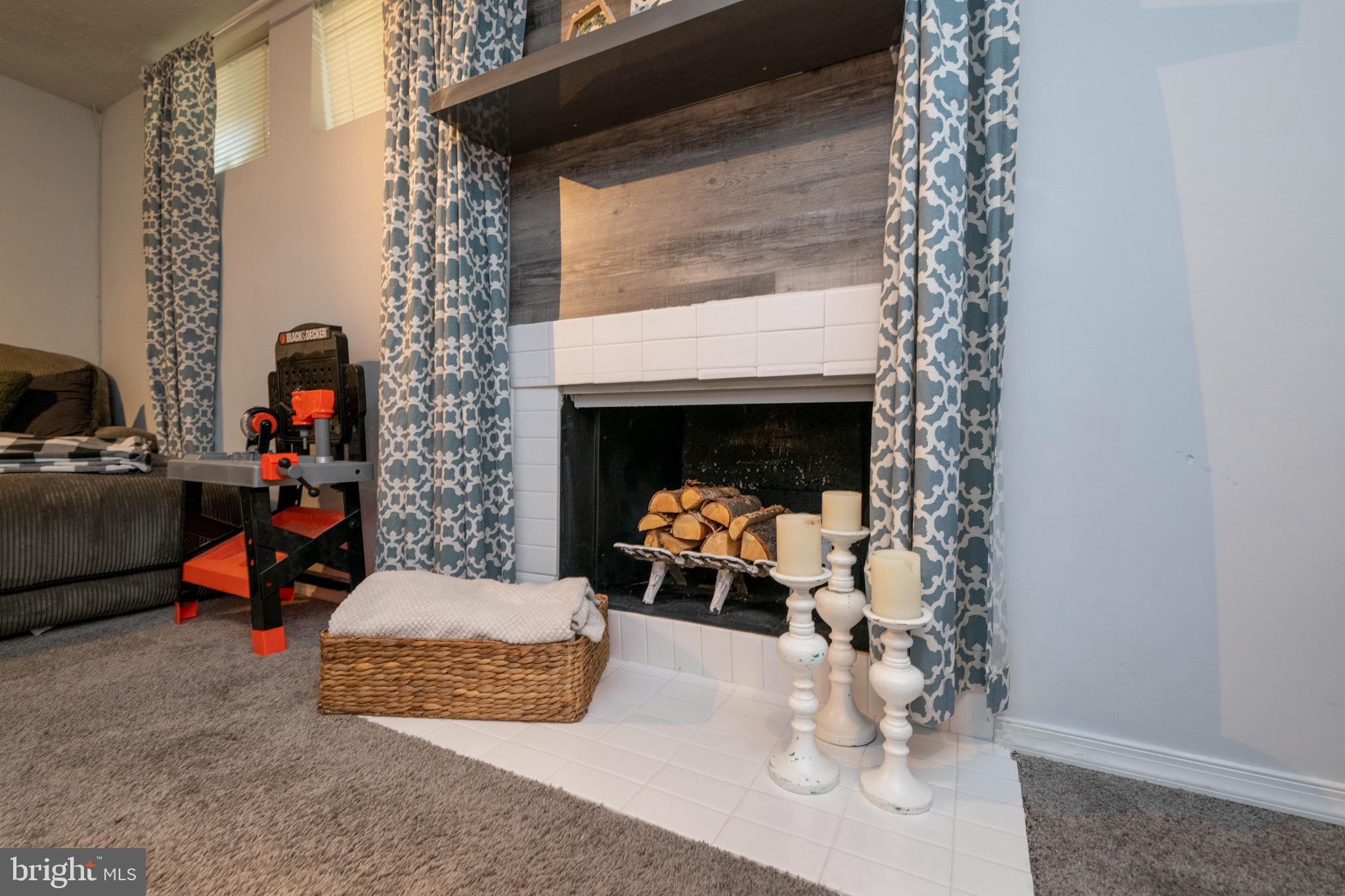 5469 Princess Drive Rosedale, MD 21237 - Photo 36 of 45 Nice fireplace to cozy up at
