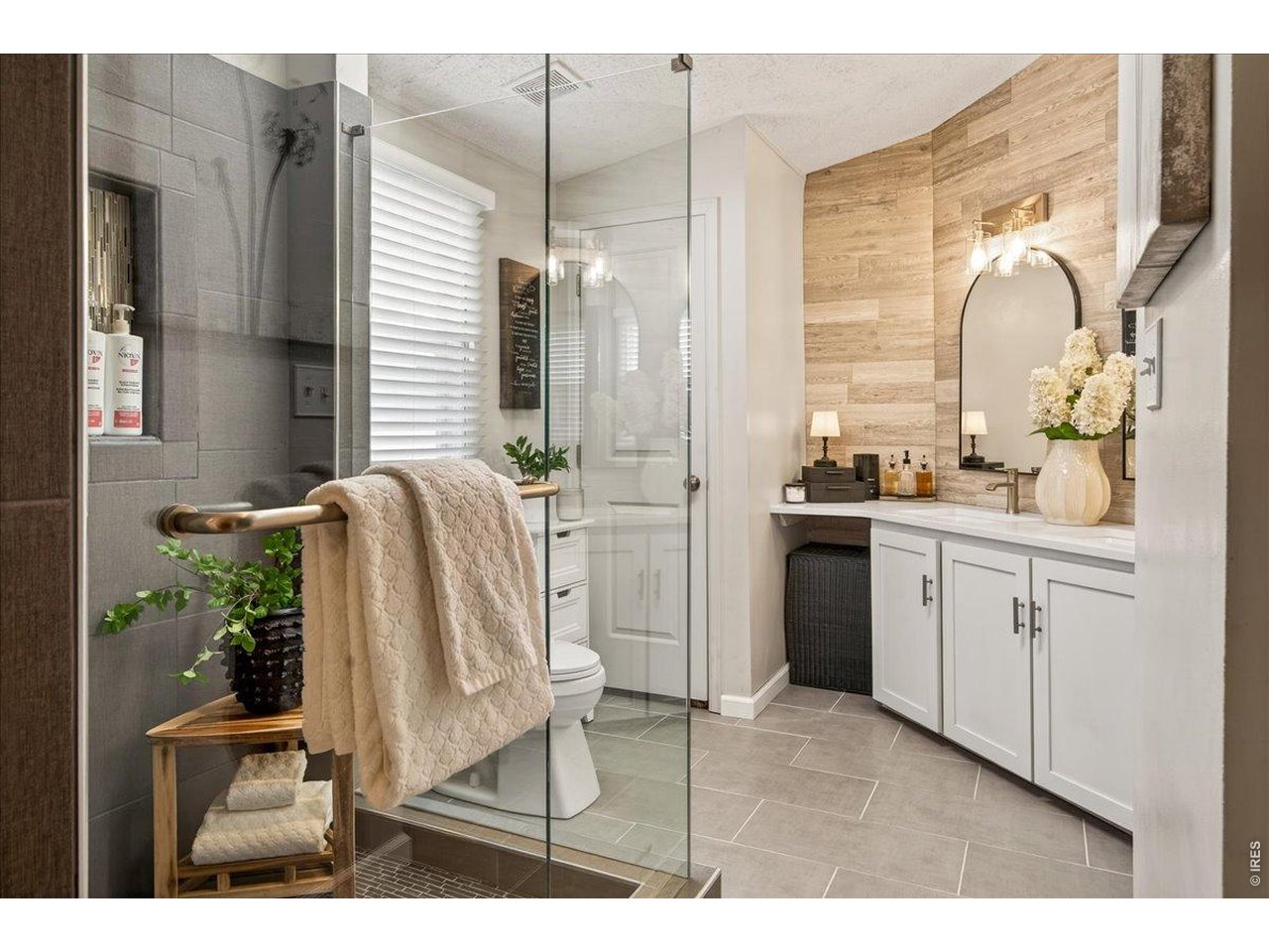 8410 Madison Way Denver, CO 80229 - Photo 13 of 40 Updated bathroom designed for a relaxing, spa-like experience.