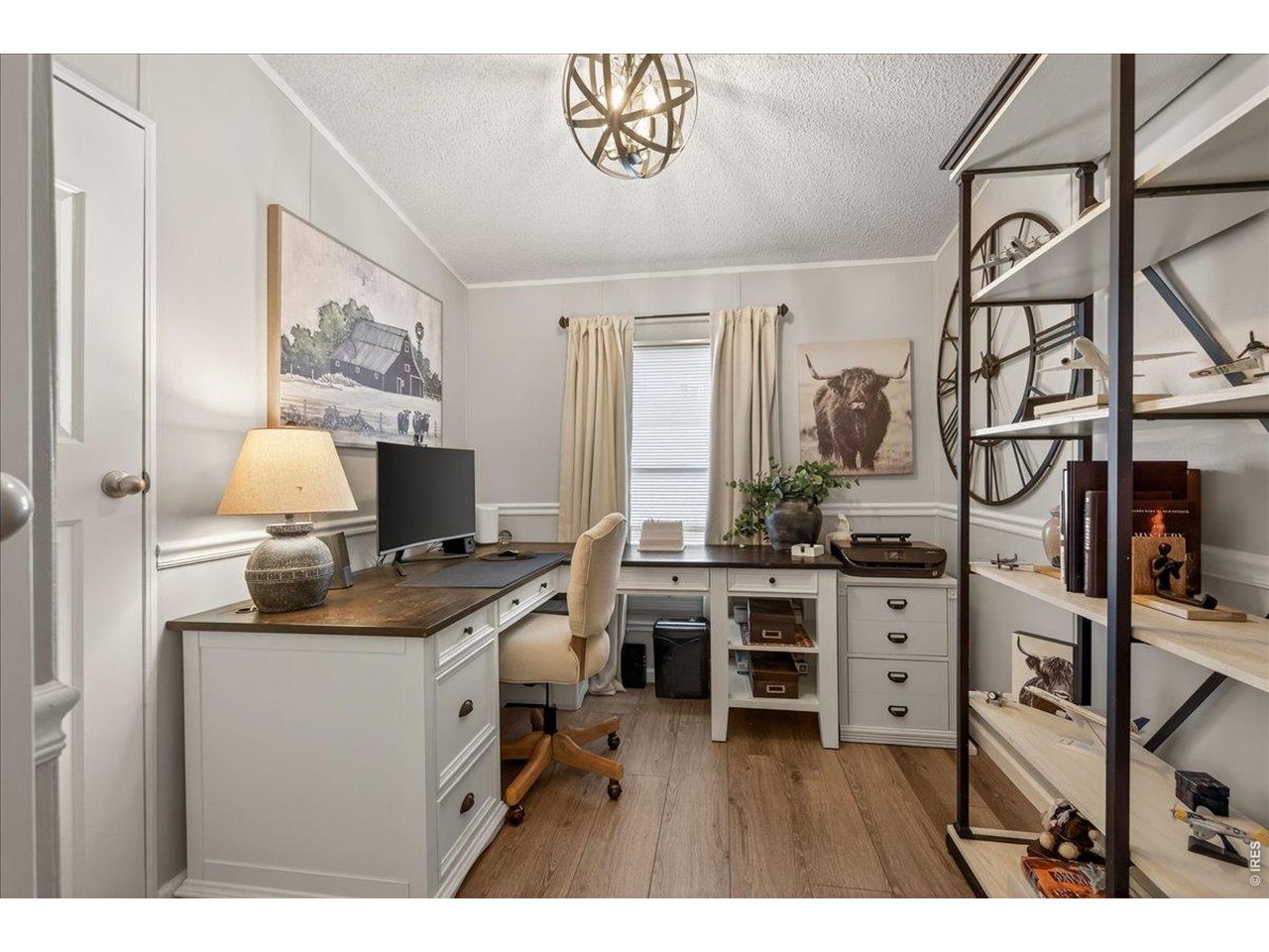 8410 Madison Way Denver, CO 80229 - Photo 17 of 40 Sun-filled windows bring in light and highlight the home's neutral palette.