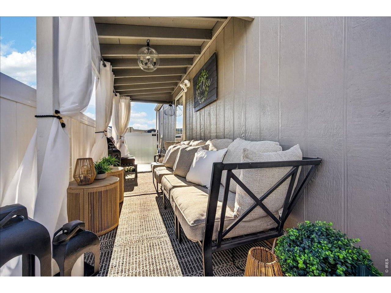 8410 Madison Way Denver, CO 80229 - Photo 22 of 40 Enjoy your own private outdoor retreat with a spacious covered deck for year-round use.