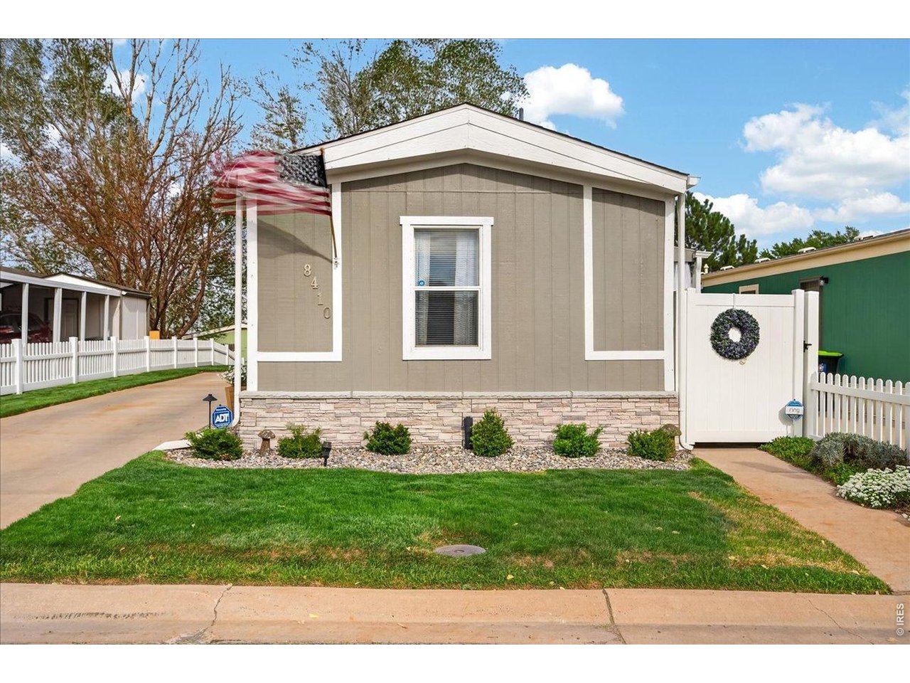 8410 Madison Way Denver, CO 80229 - Photo 29 of 40 This well-cared-for property offers attractive curb appeal with simple, low-maintenance landscaping.