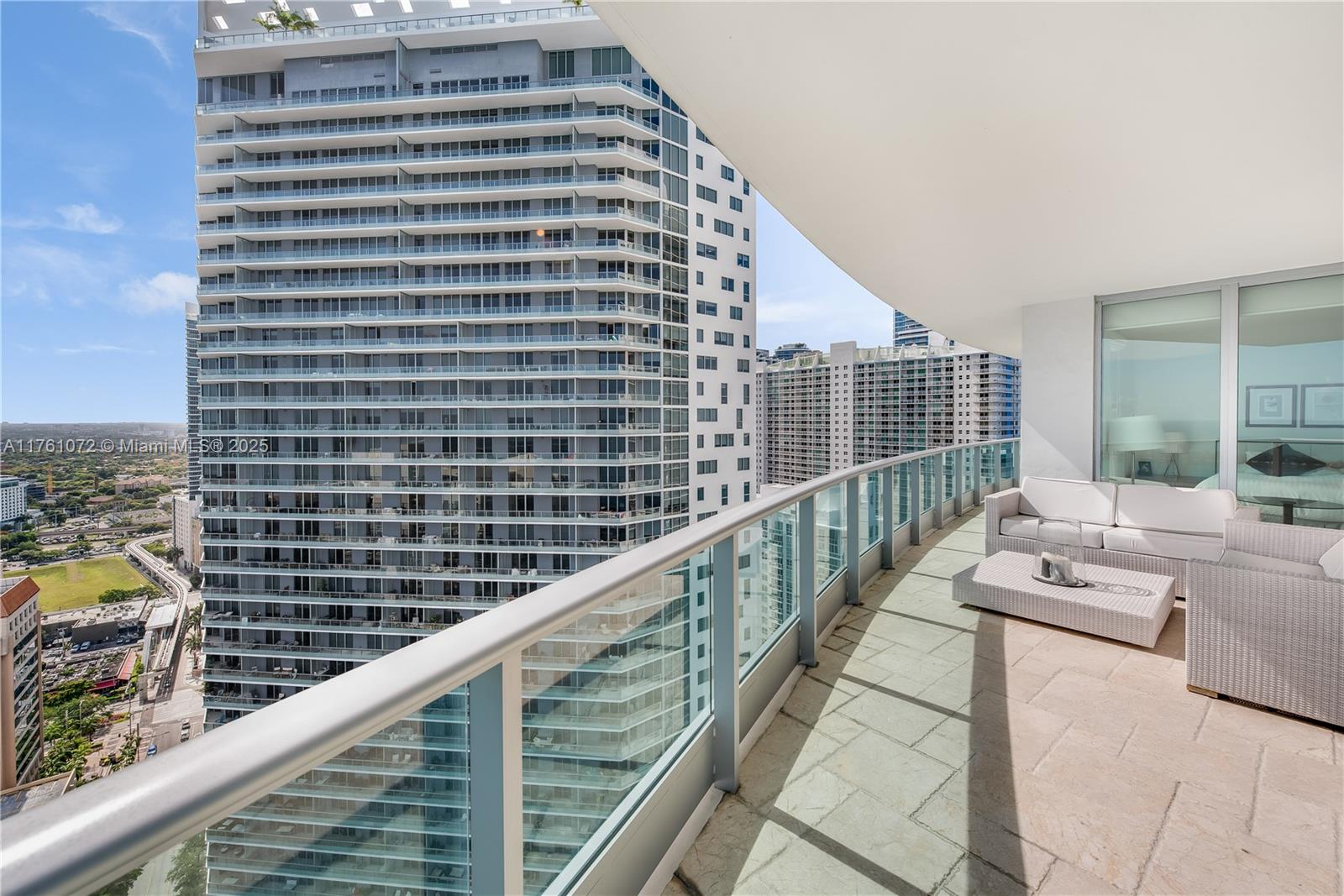 1331 Brickell Bay Drive, Unit 3311 Miami, FL 33131 - Photo 11 of 43 a view of balcony with couch