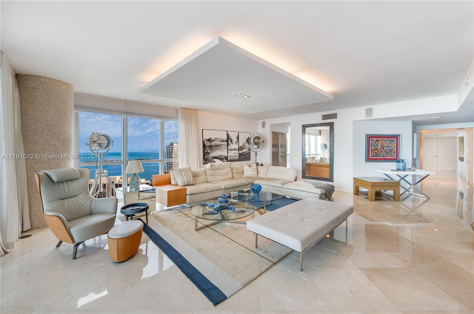 1331 Brickell Bay Drive, Unit 3311 Miami, FL 33131 - Photo 27 of 43 a living room with furniture and a wooden floor