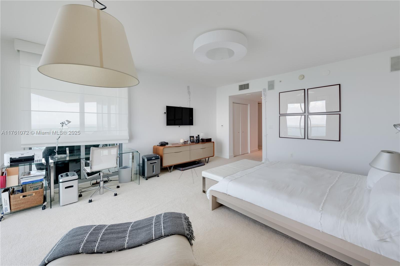 1331 Brickell Bay Drive, Unit 3311 Miami, FL 33131 - Photo 40 of 43 a bedroom with furniture and a window