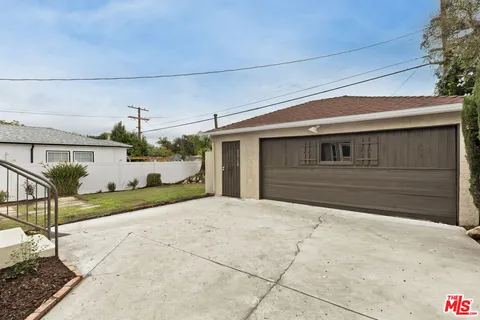 a front view of a house with a garage