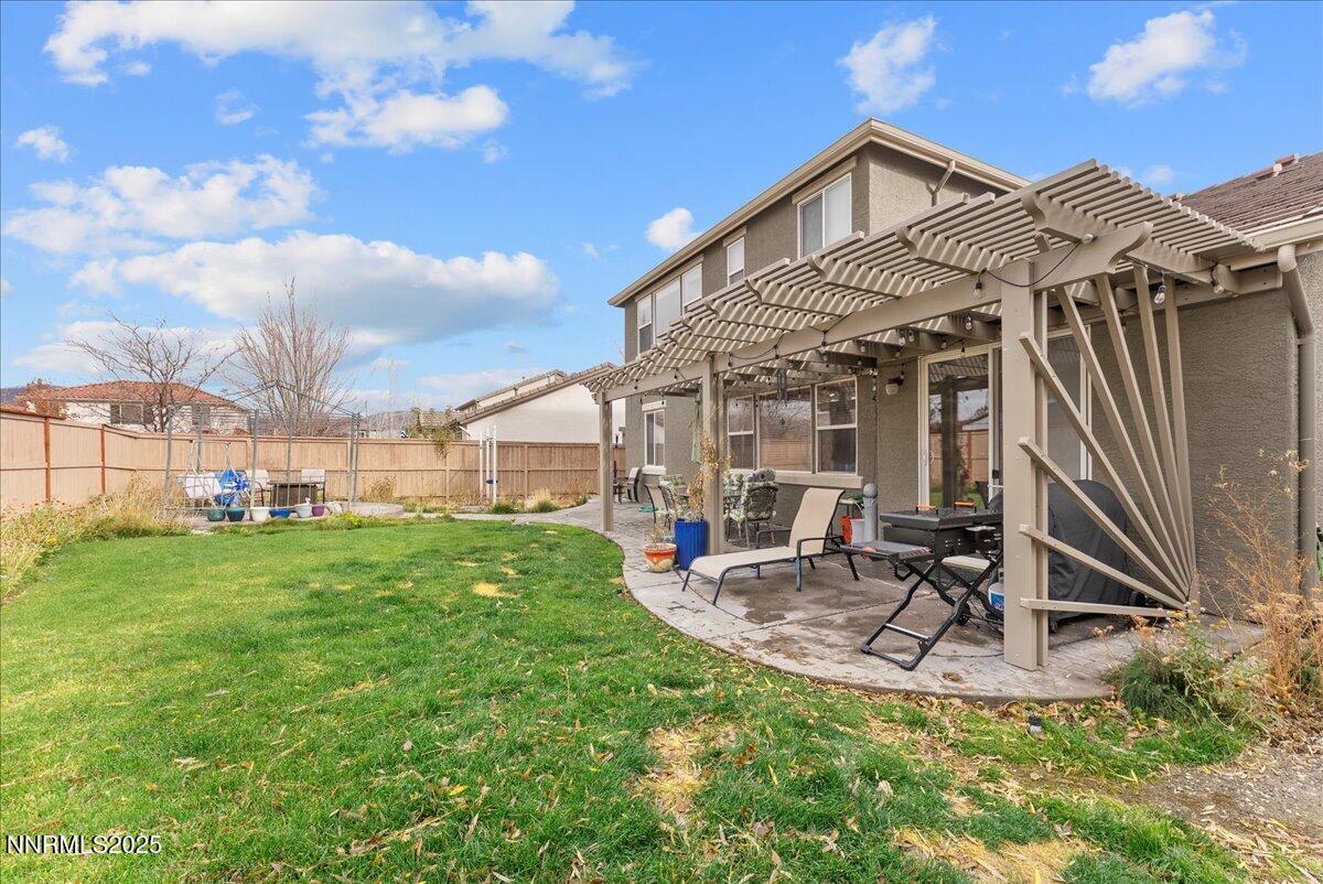 10755 Copper Lake Drive Reno, NV 89521 - Photo 33 of 40 a front view of a house with a yard