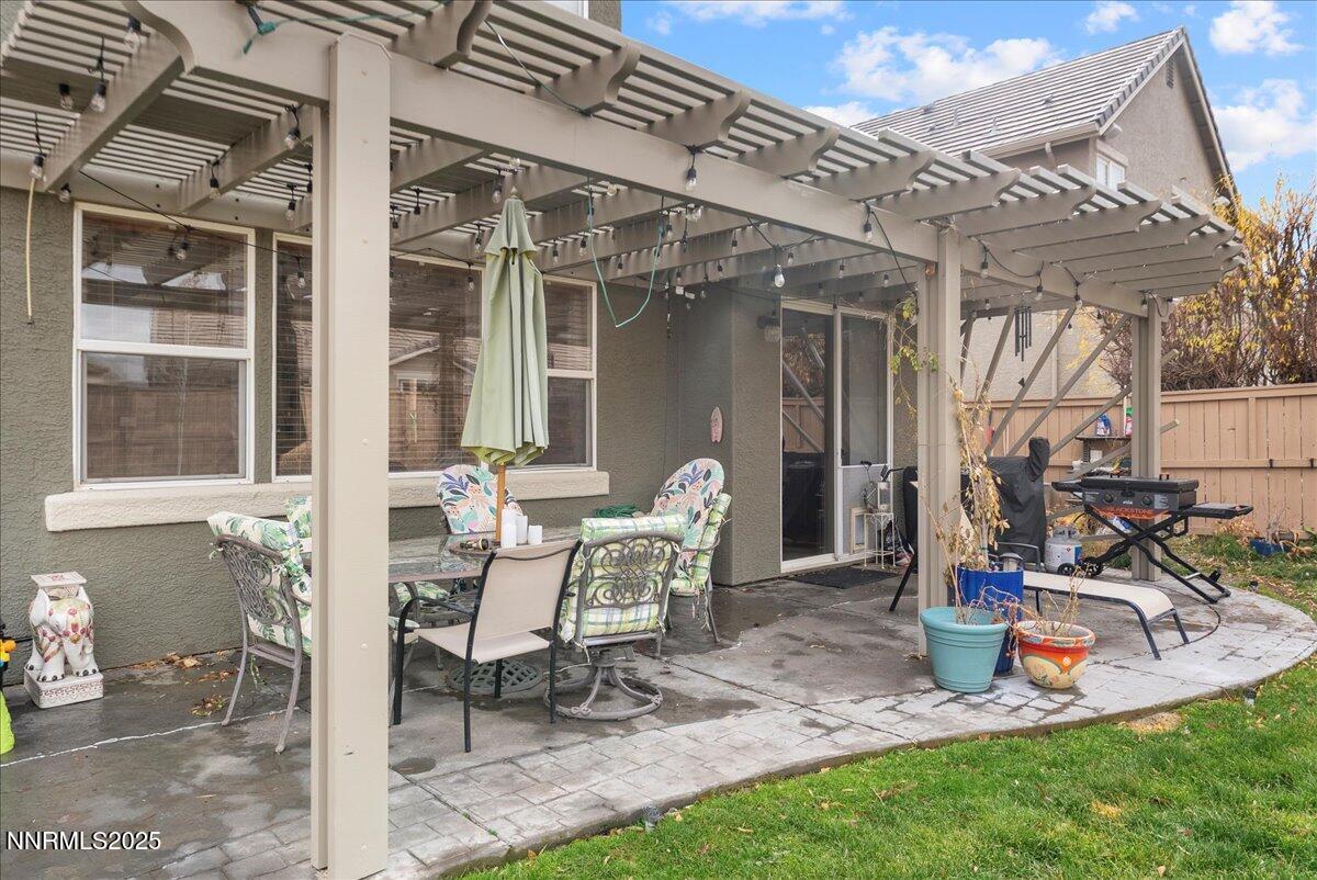 10755 Copper Lake Drive Reno, NV 89521 - Photo 34 of 40 a view of a house with backyard and porch
