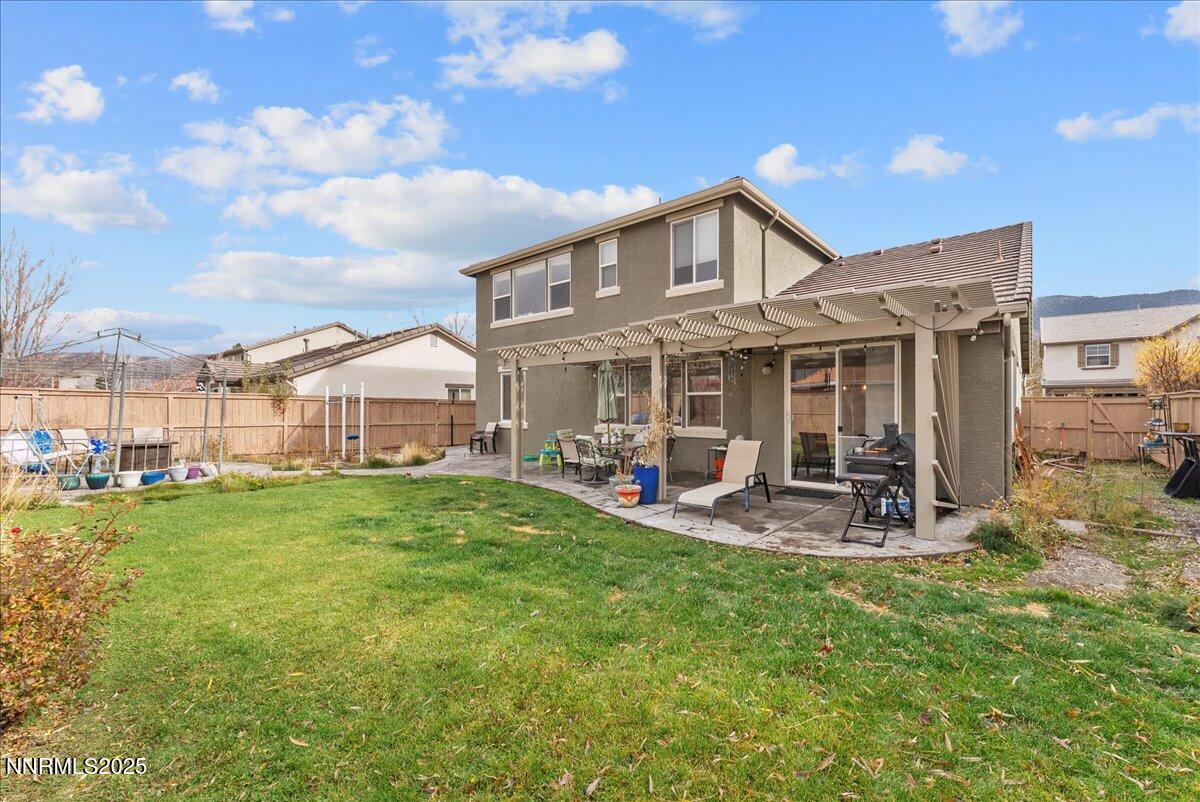 10755 Copper Lake Drive Reno, NV 89521 - Photo 36 of 40 a view of a house with a yard and sitting area