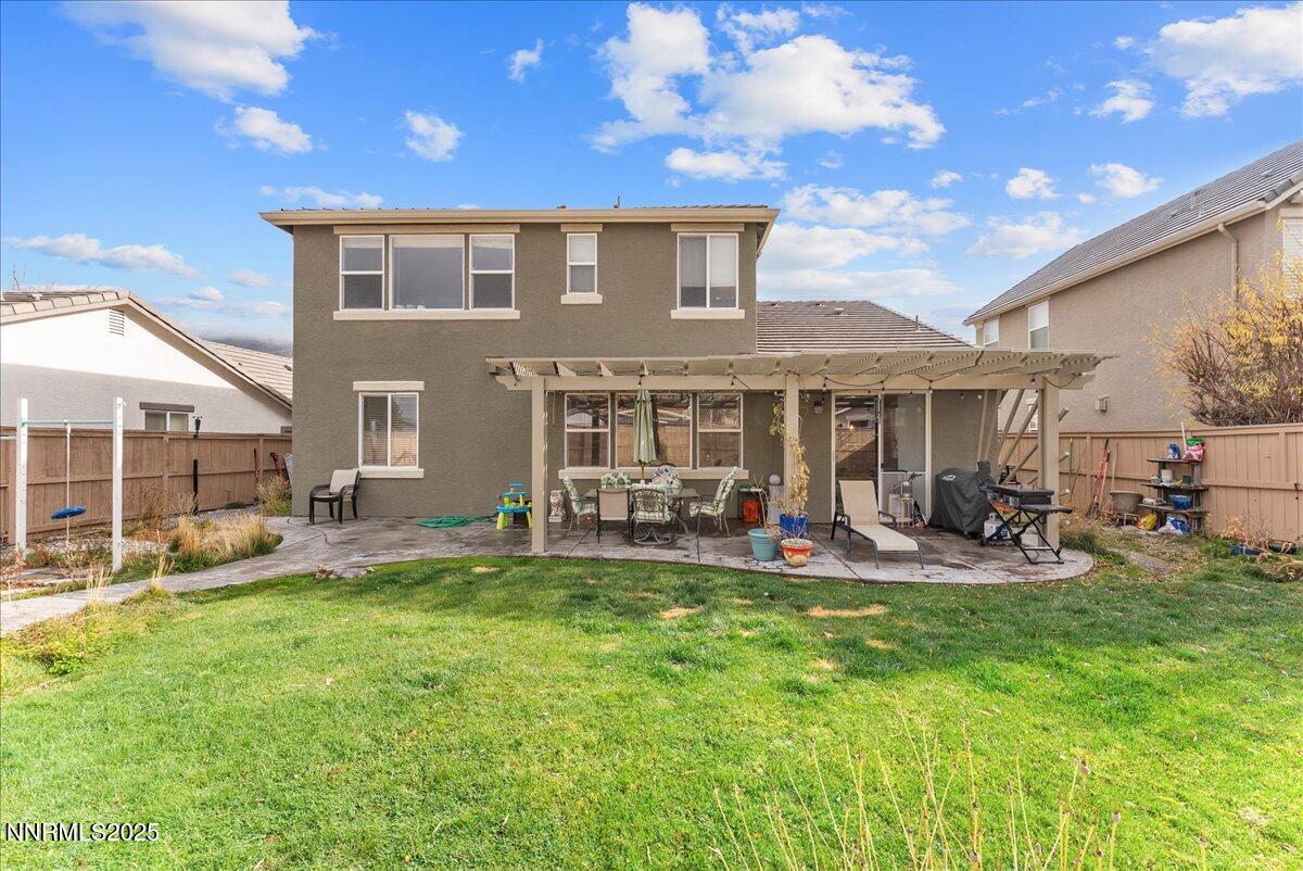 10755 Copper Lake Drive Reno, NV 89521 - Photo 38 of 40 a view of a house with a yard and sitting area