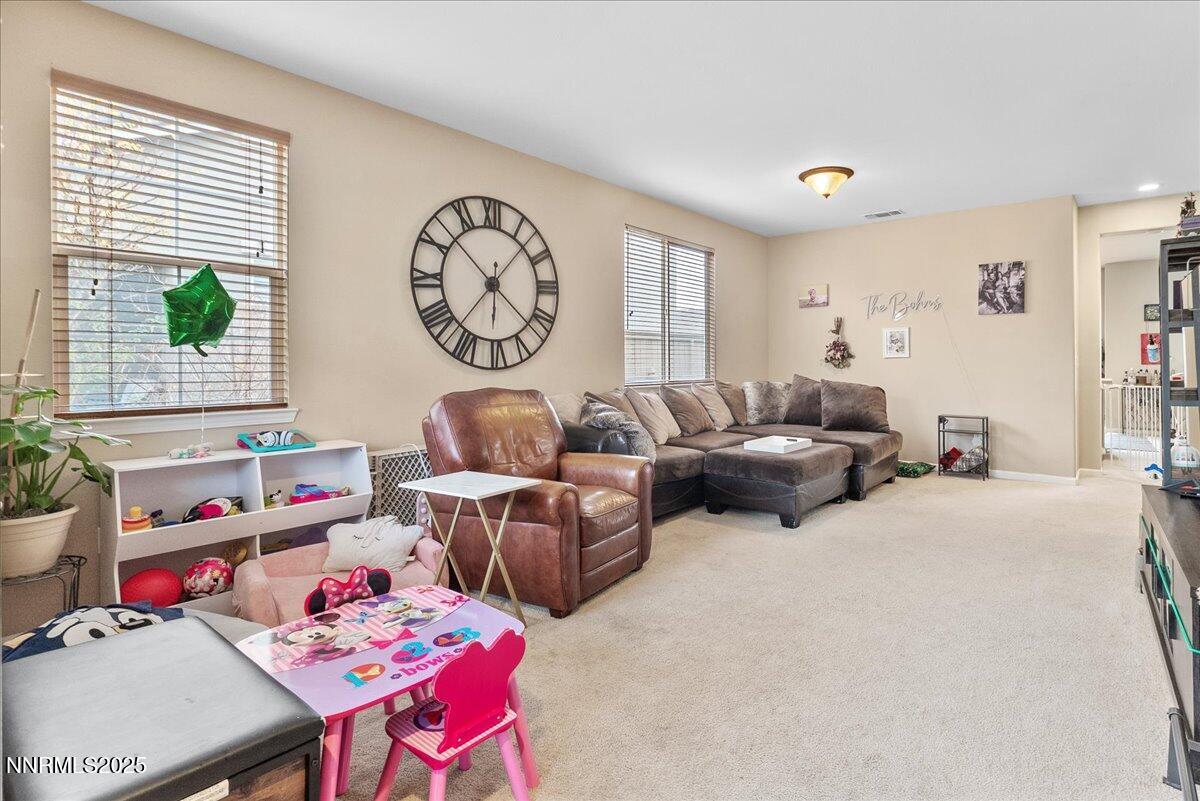 10755 Copper Lake Drive Reno, NV 89521 - Photo 5 of 40 a living room with furniture and a window