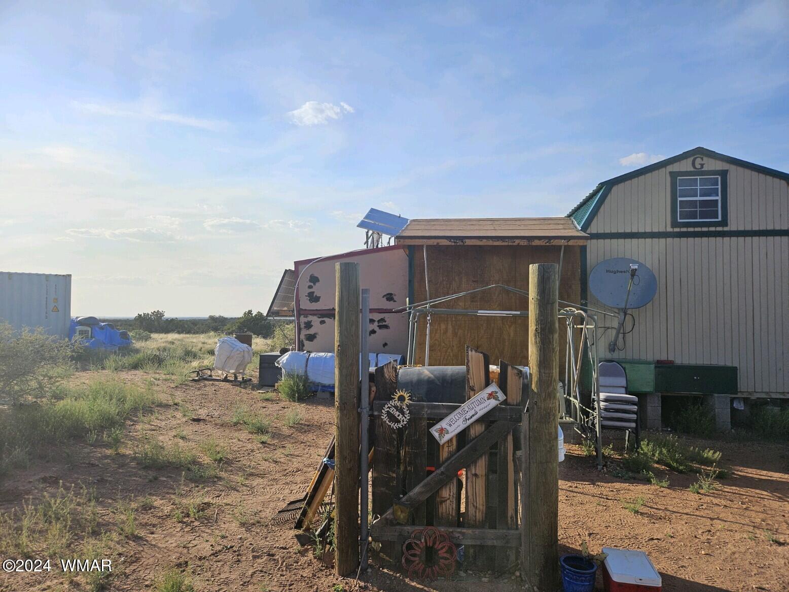 110 County Road Concho, AZ 85924 - Photo 2 of 21 a view of a house with backyard