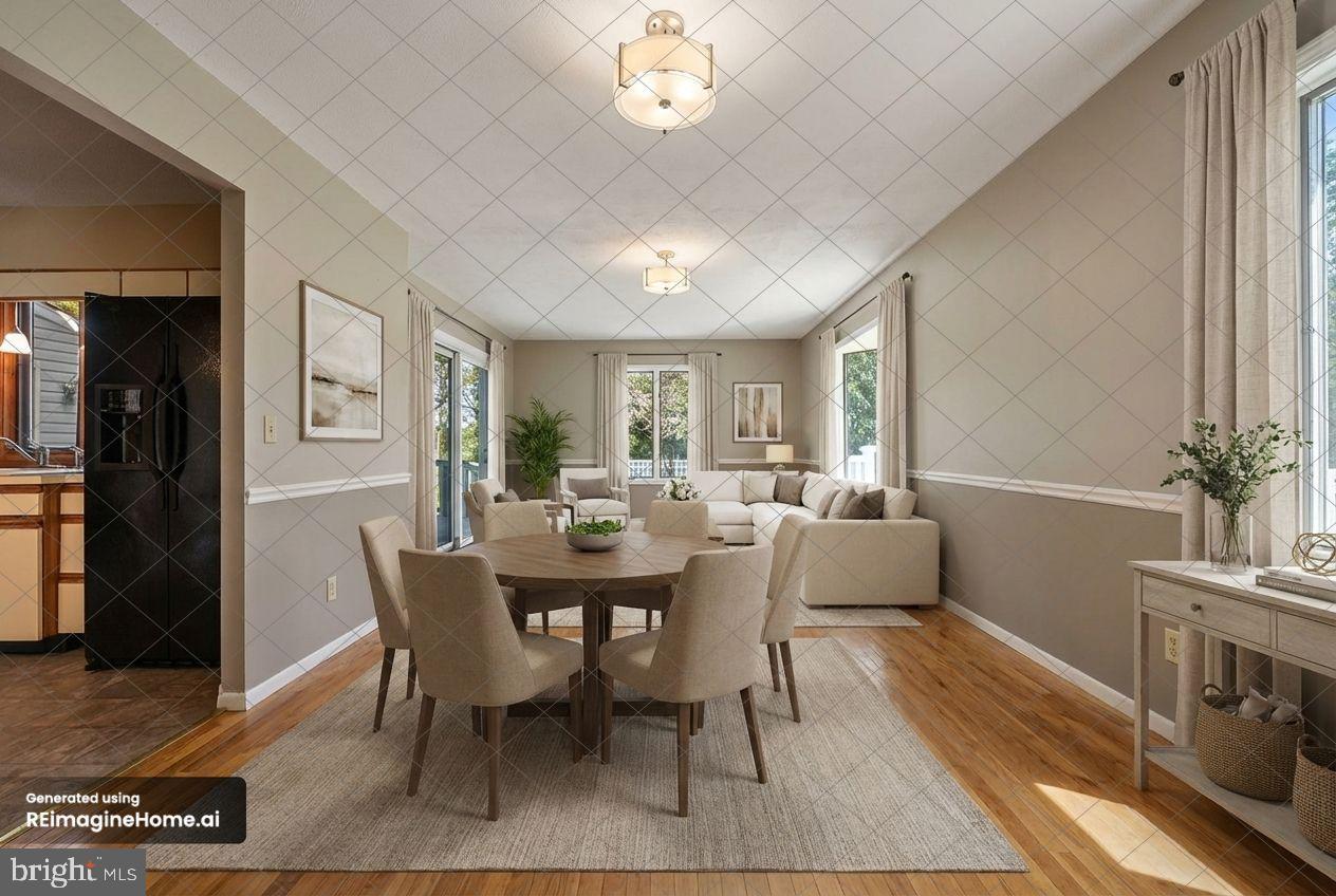 210 Cambridge Road Camden Wyoming, DE 19934 - Photo 12 of 35 a view of a dining room with furniture and wooden floor