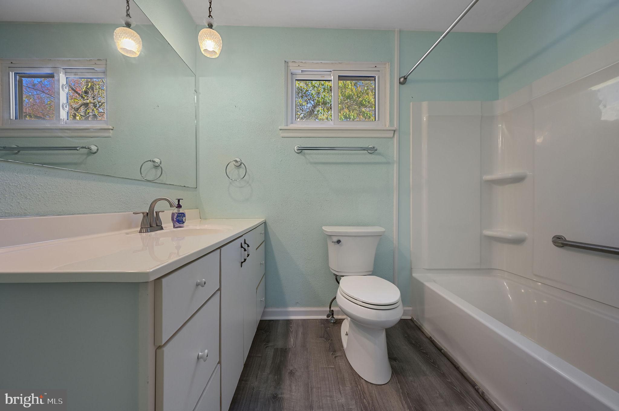 210 Cambridge Road Camden Wyoming, DE 19934 - Photo 22 of 35 a bathroom with a toilet sink and a bathtub
