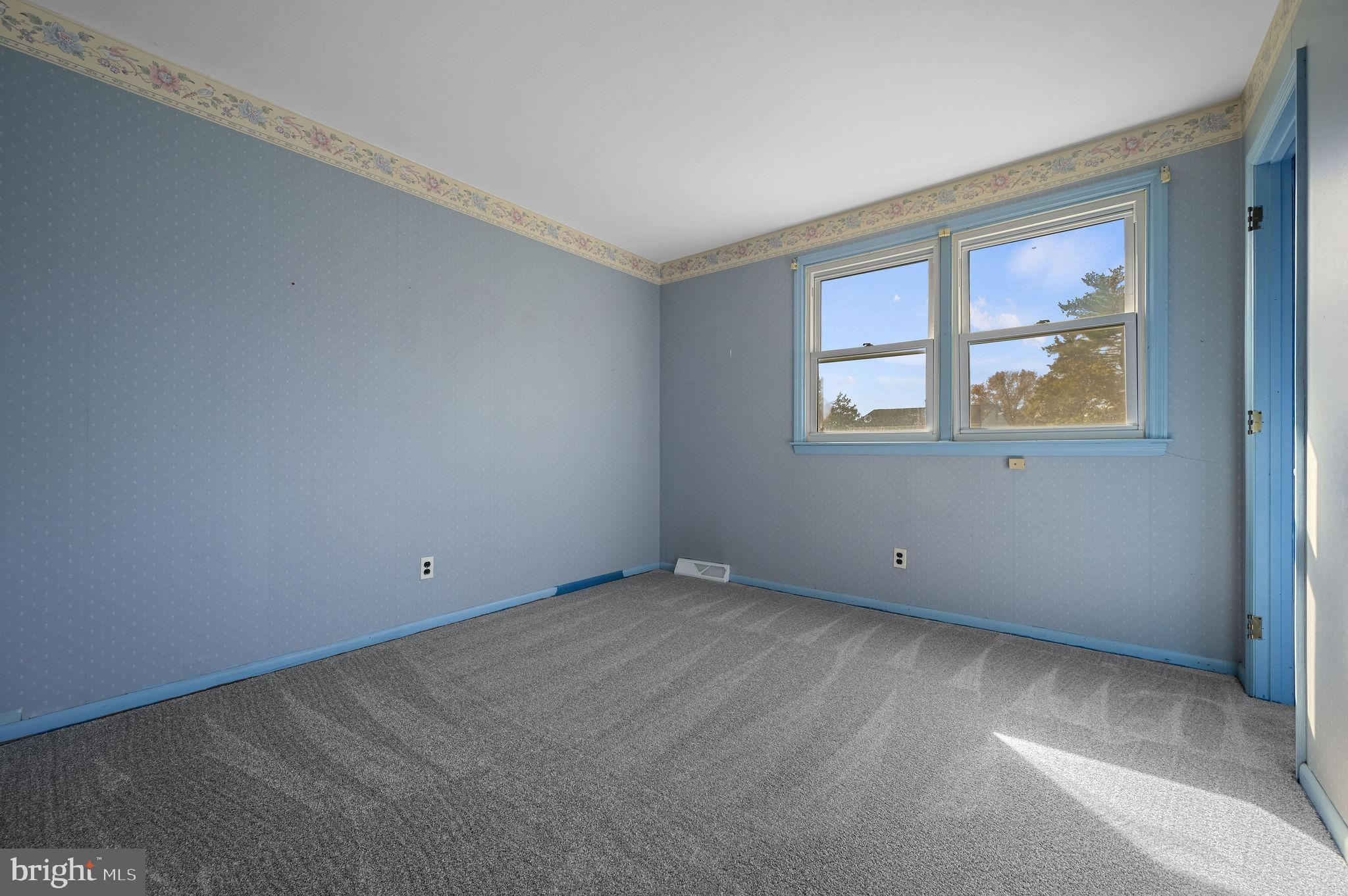 210 Cambridge Road Camden Wyoming, DE 19934 - Photo 23 of 35 an empty room with a window