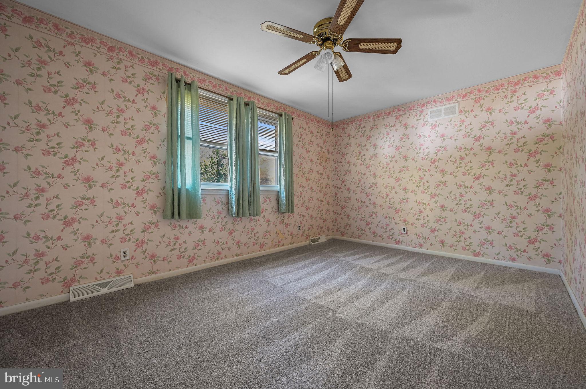 210 Cambridge Road Camden Wyoming, DE 19934 - Photo 26 of 35 a view of an empty room with a window