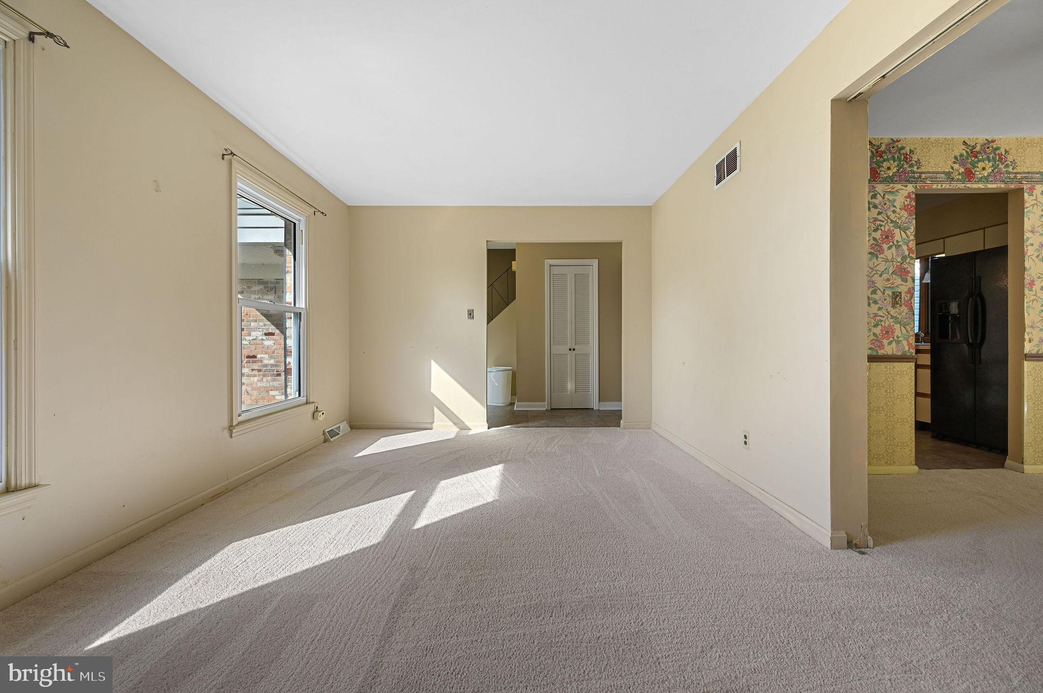 210 Cambridge Road Camden Wyoming, DE 19934 - Photo 3 of 35 an empty room with windows and closet