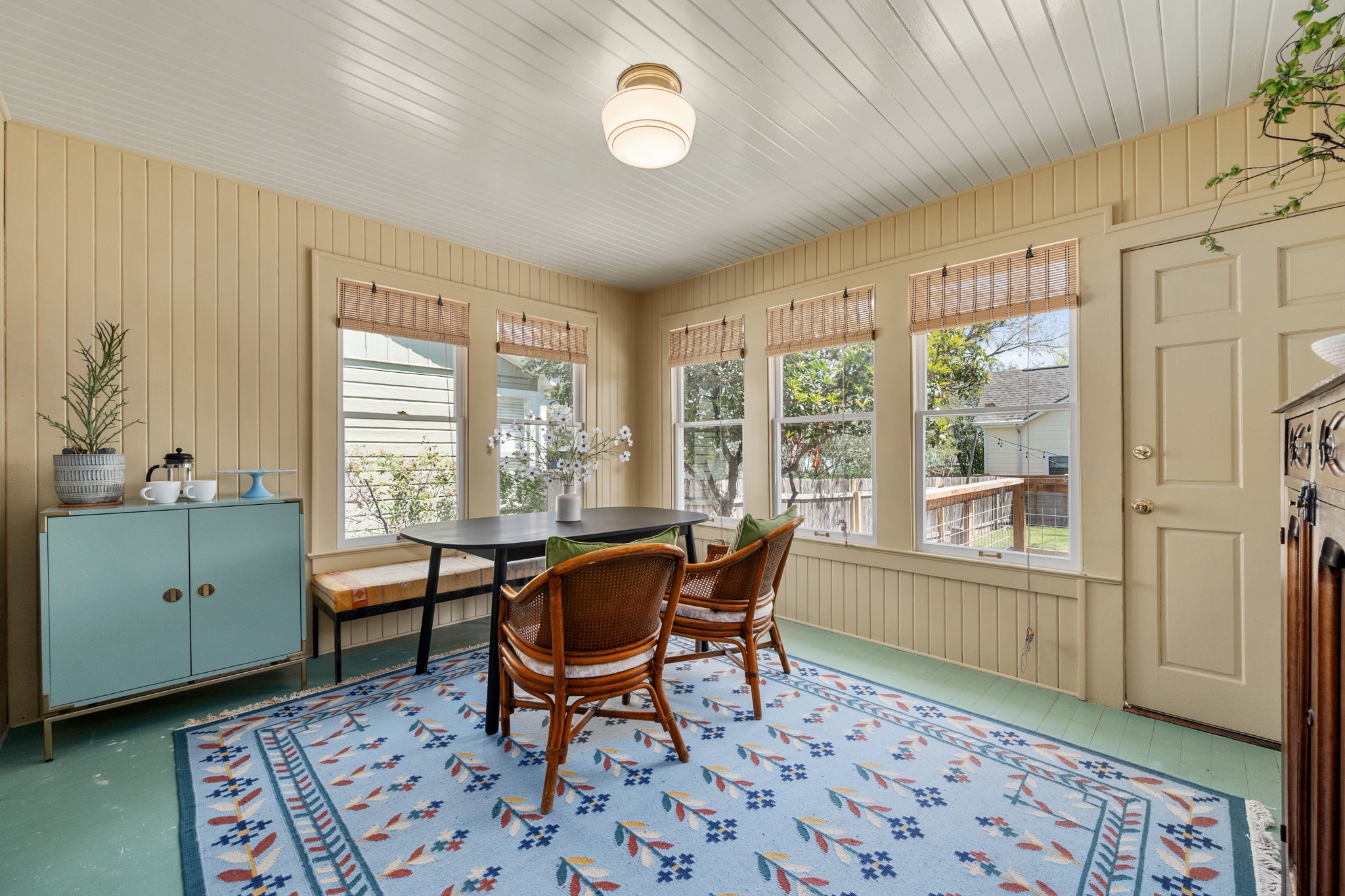 3909 Becker Avenue Austin, TX 78751 - Photo 14 of 38 Dining space with wooden walls and plenty of natural light