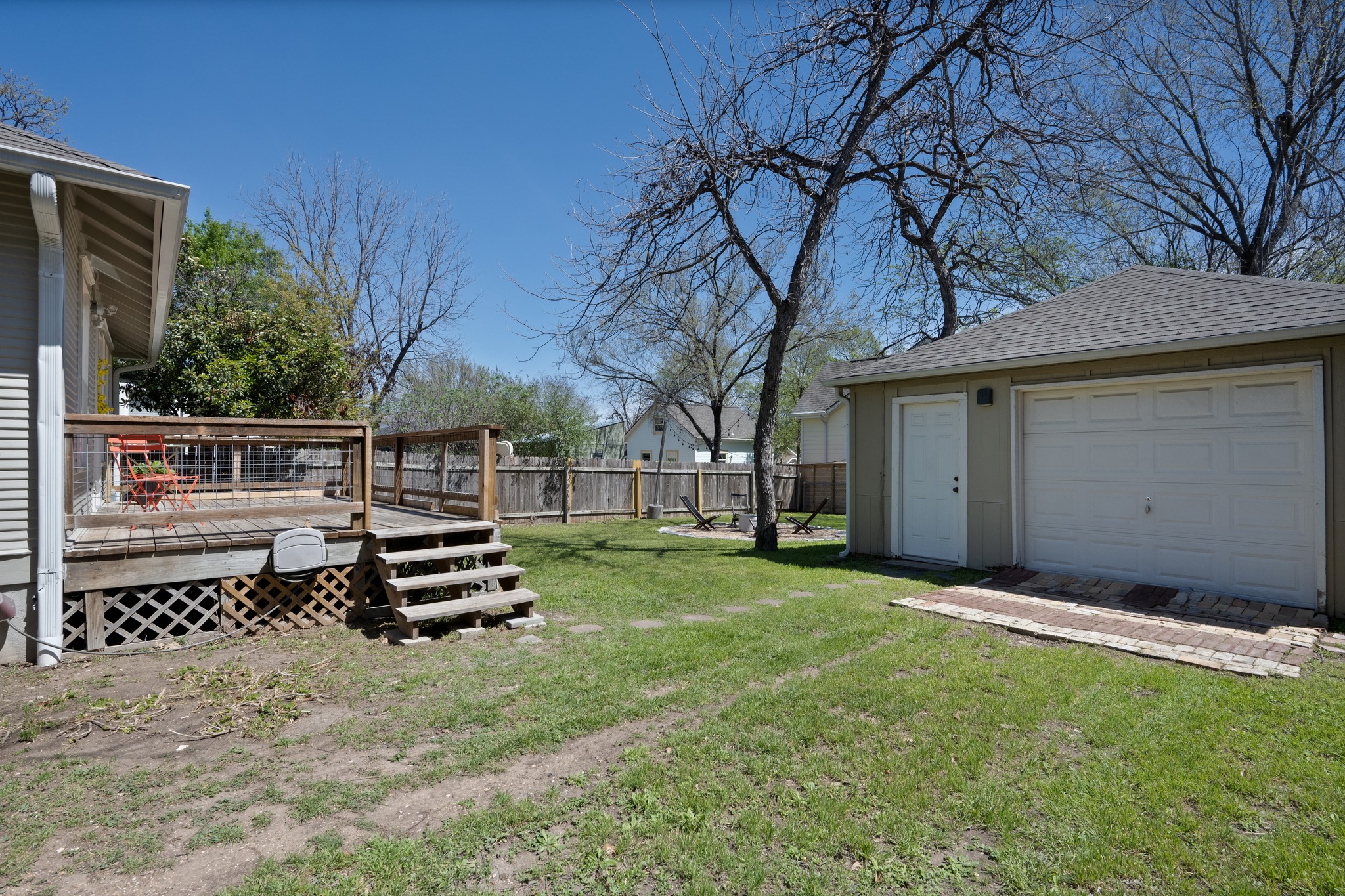 3909 Becker Avenue Austin, TX 78751 - Photo 25 of 38 Fenced yard with an outdoor structure and a wooden deck