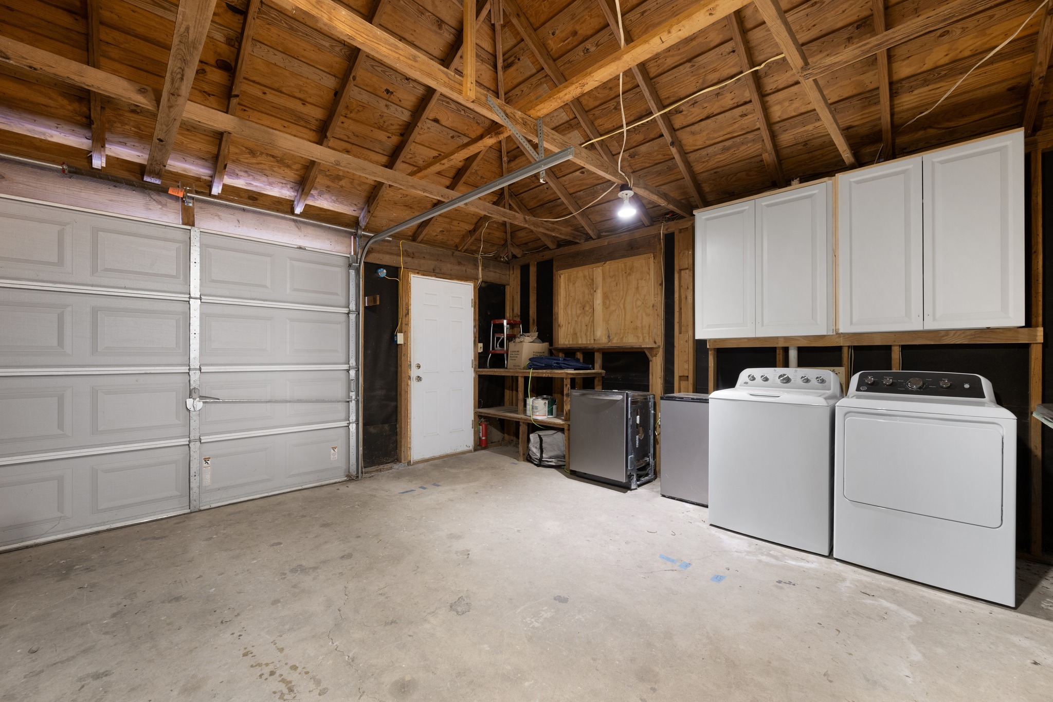 3909 Becker Avenue Austin, TX 78751 - Photo 27 of 38 Garage featuring washer and dryer