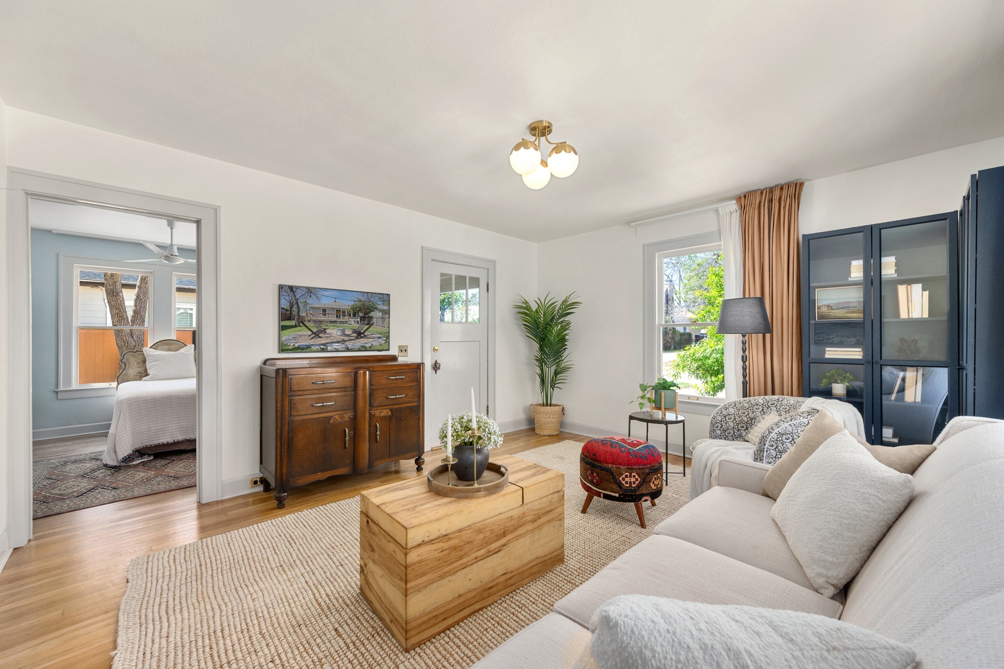 3909 Becker Avenue Austin, TX 78751 - Photo 9 of 38 Living area with wood finished floors and baseboards