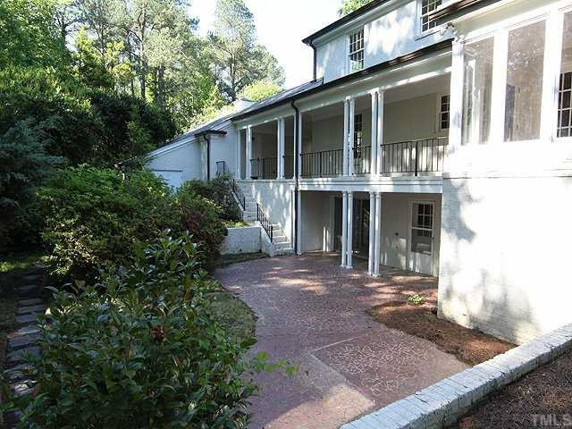 6616 Pleasant Pines Drive Raleigh, NC 27613 - Photo 13 of 15 View of back patio / porch and garden area waiting your restoration. Patio/Deck