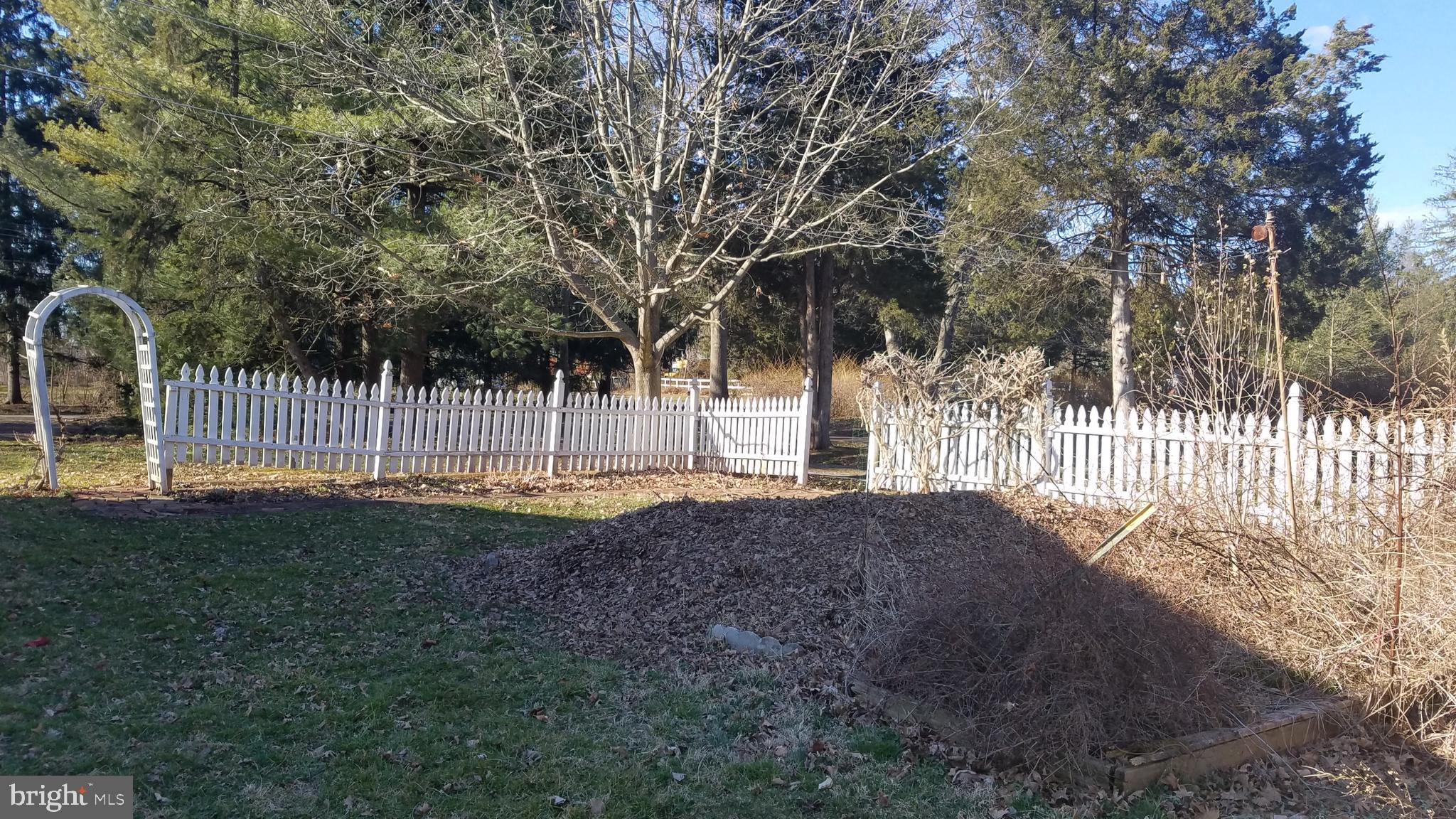 2025 Springer Road Harleysville, PA 19438 - Photo 21 of 29 side yard with garden beds and compost pile