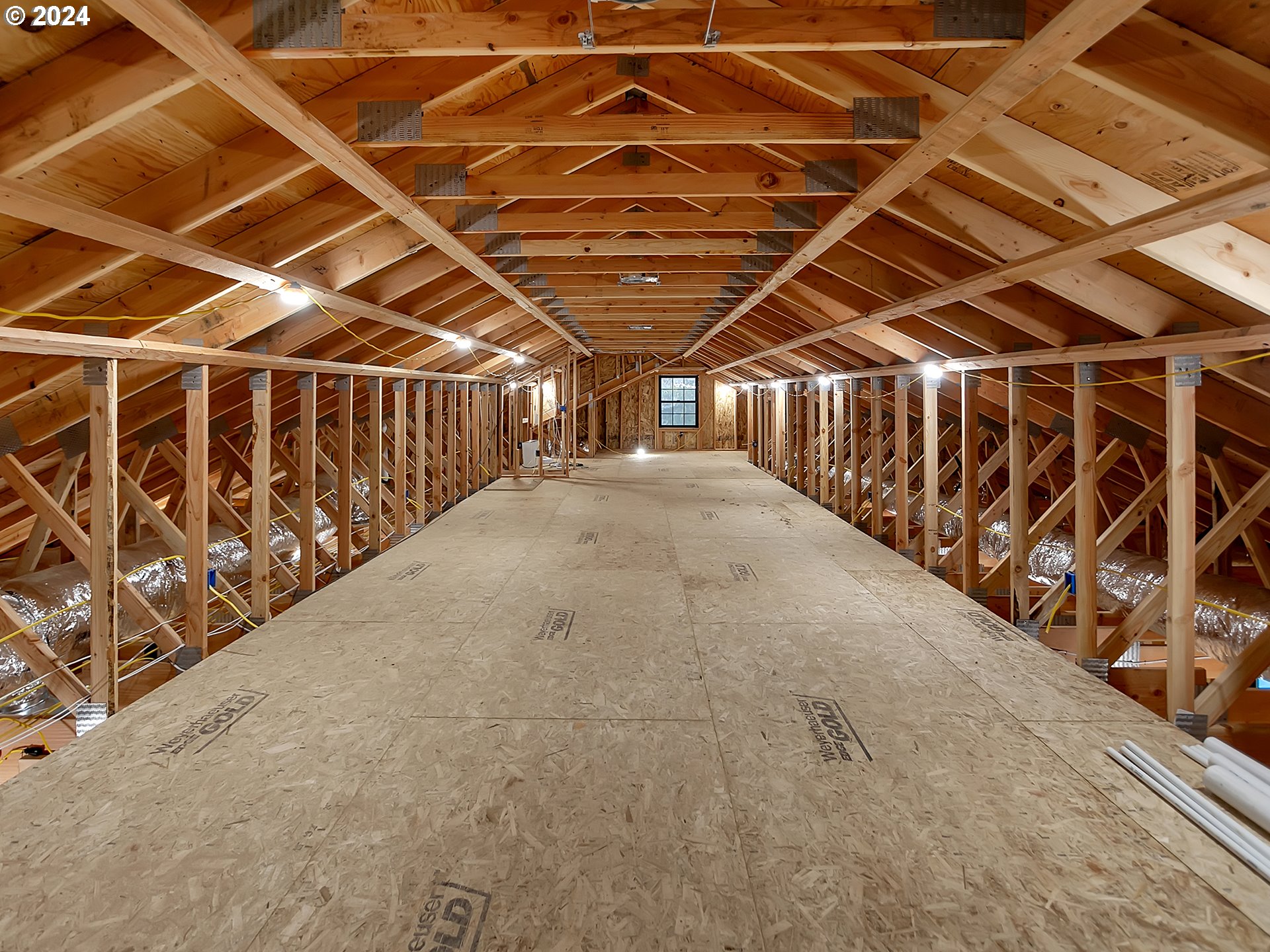27778 Briggs Hill Road Eugene, OR 97405 - Photo 18 of 25 a view of an empty room with wooden floor