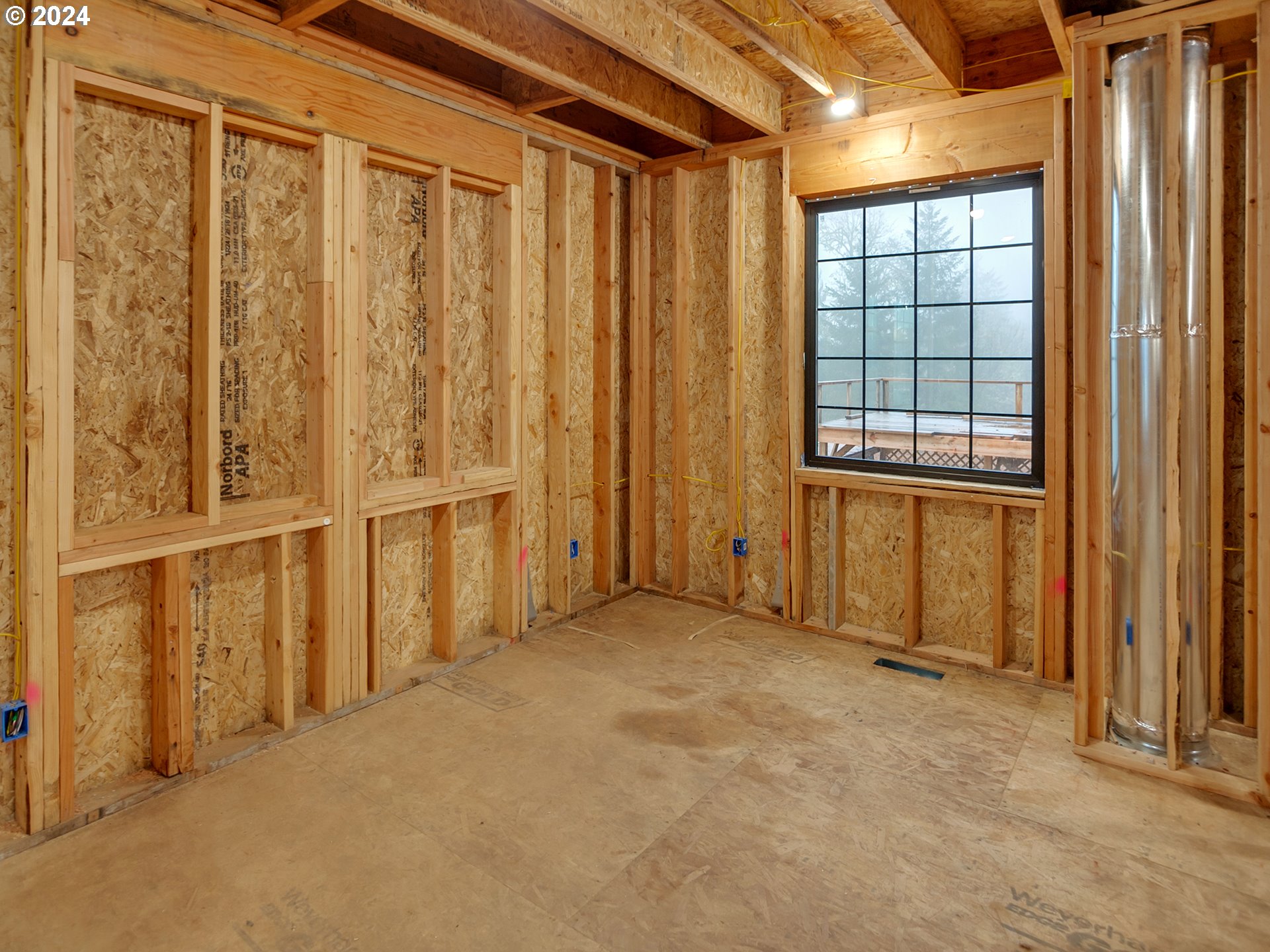 27778 Briggs Hill Road Eugene, OR 97405 - Photo 9 of 25 an empty room with windows