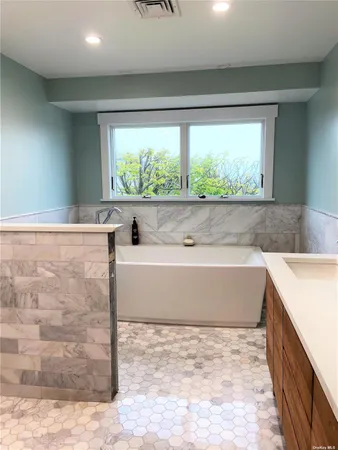 a view of bath tub sitting in a kitchen