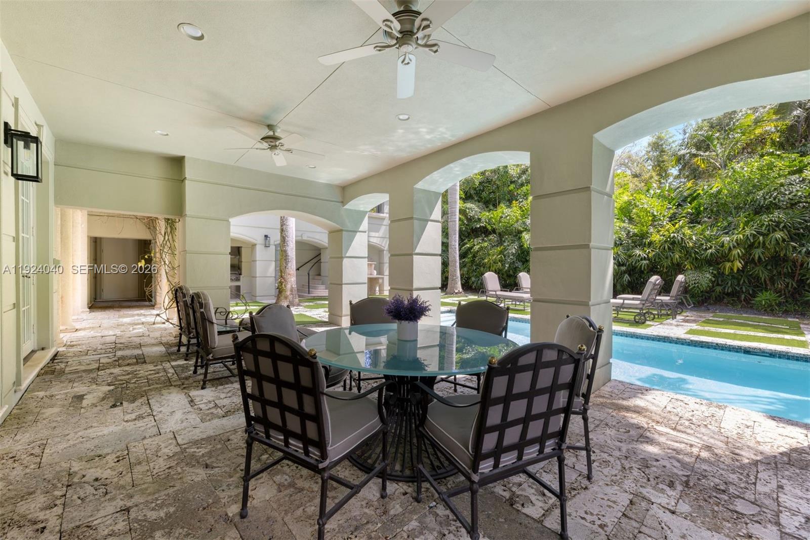 3460 South Moornings Way Miami, FL 33133 - Photo 11 of 29 a view of a dining room with furniture window and wooden floor