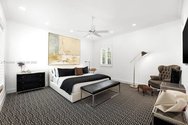 a bedroom with furniture and a window