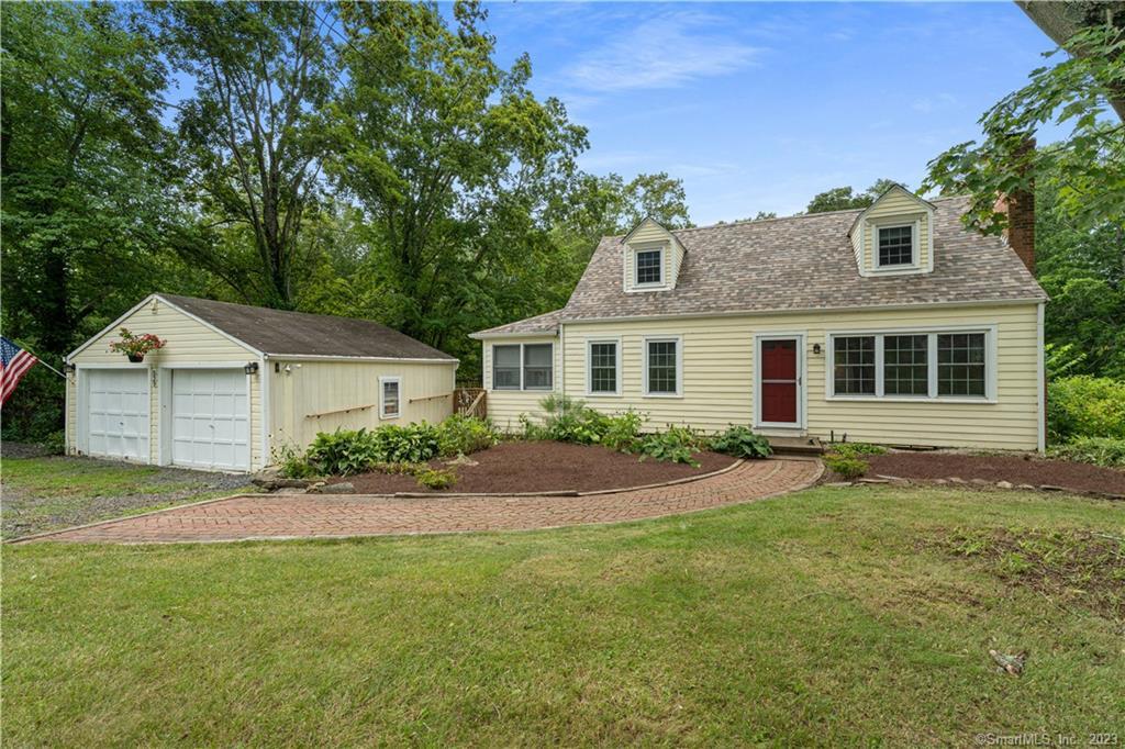 529 Horse Pond Road Madison, CT 06443 - Photo 1 of 1 a view of a yard in front of a house with large tree
