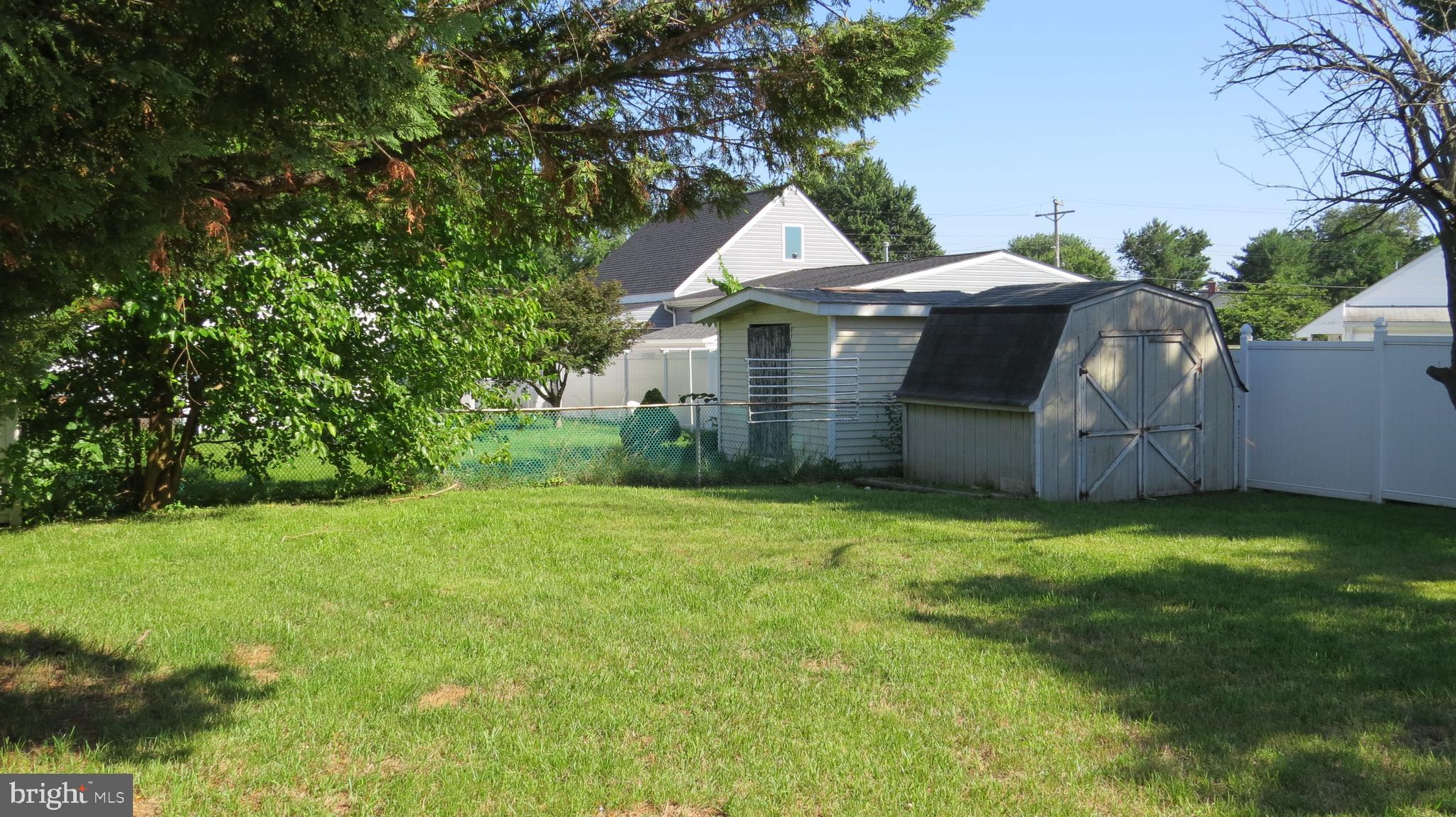 7608 Gum Road Dundalk, MD 21222 - Photo 38 of 46 Large back yard with shed