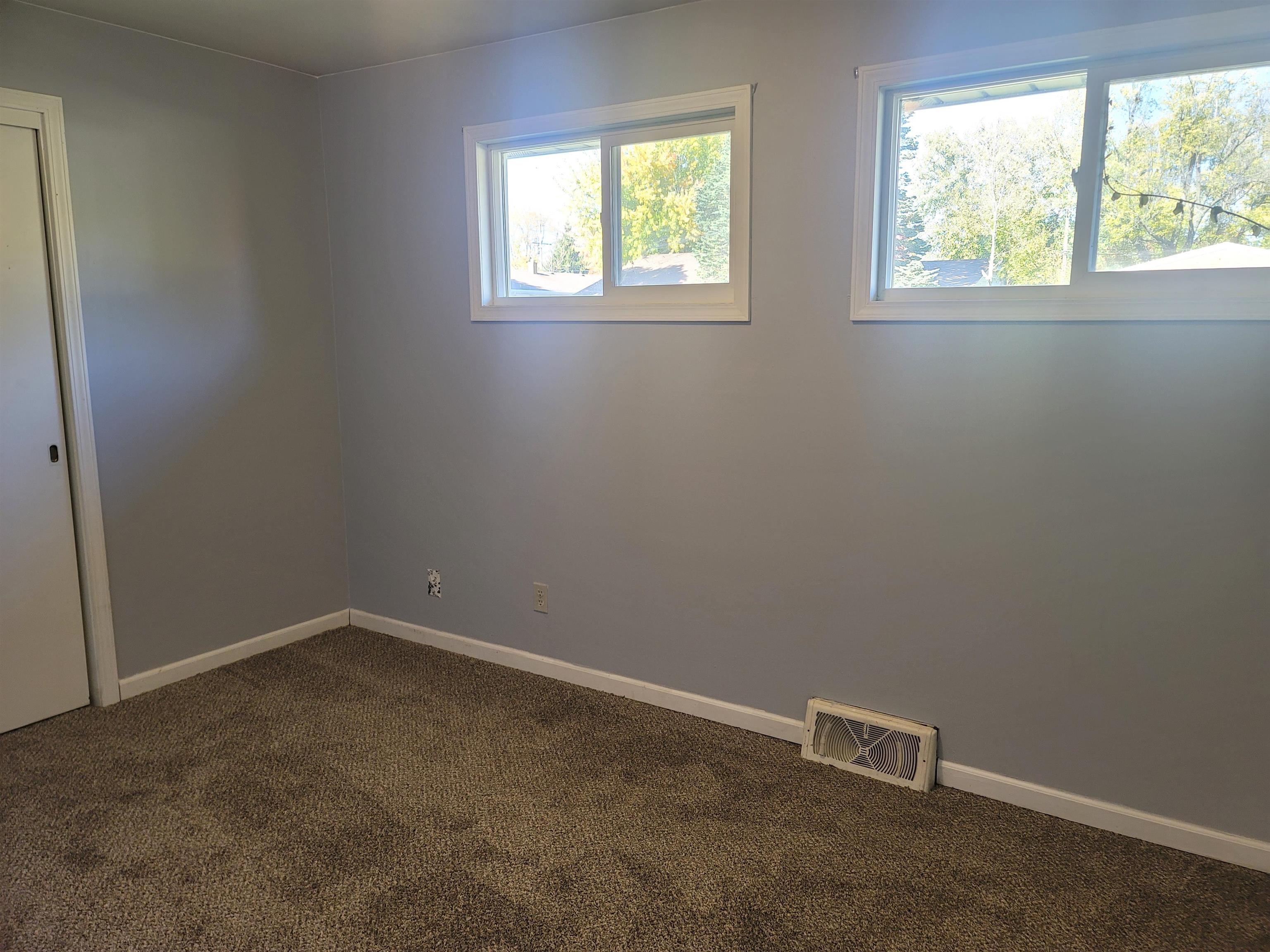 4807 Highcrest Road Rockford, IL 61107 - Photo 11 of 18 an empty room with a window
