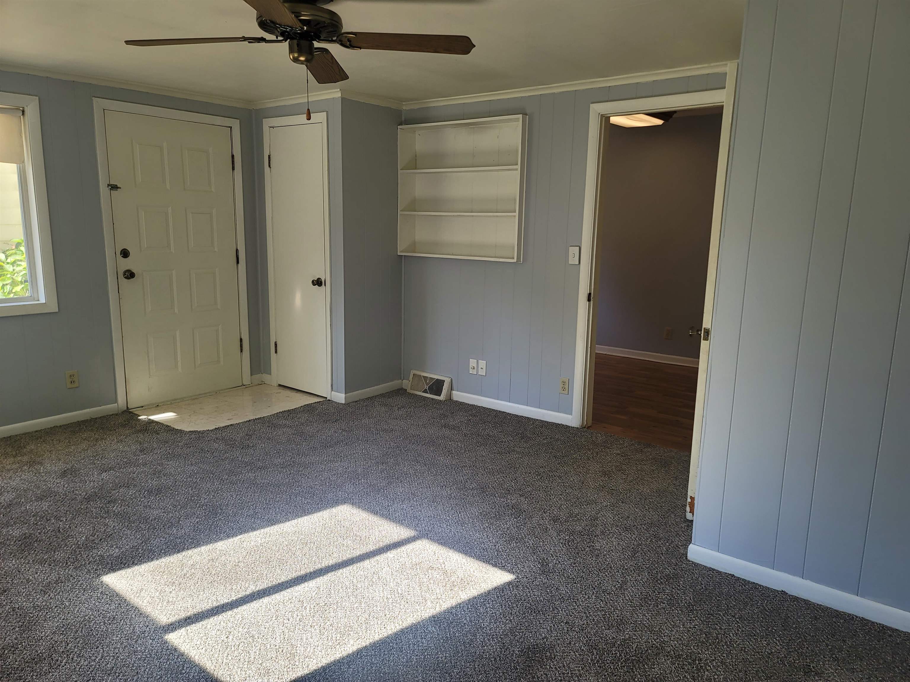 4807 Highcrest Road Rockford, IL 61107 - Photo 9 of 18 an empty room with closet and windows