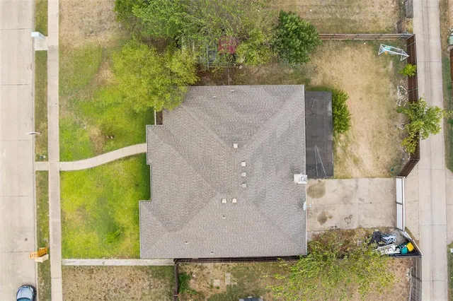 an aerial view of residential building and street