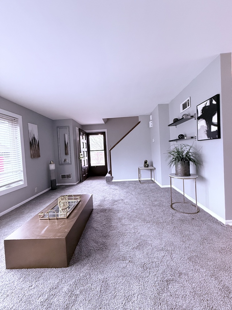 32 Dunlap Road Park Forest, IL 60466 - Photo 3 of 11 a living room with furniture and a window