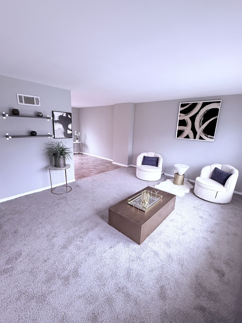 32 Dunlap Road Park Forest, IL 60466 - Photo 4 of 11 a living room with furniture and a table