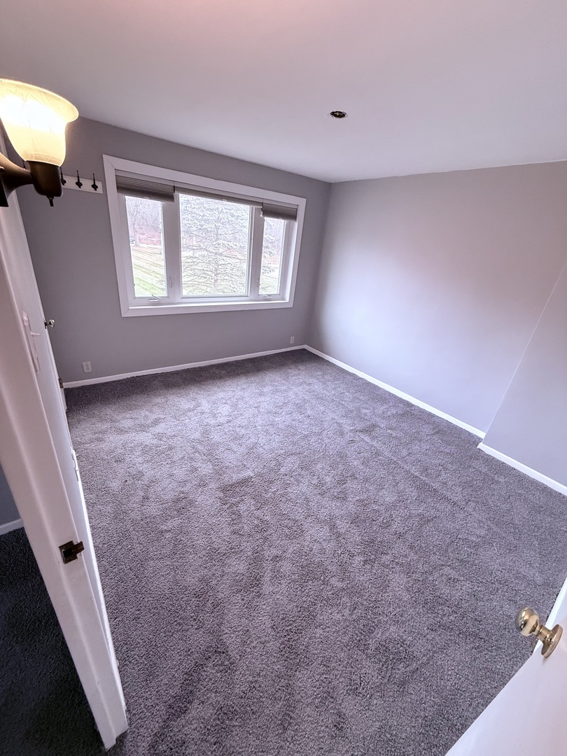 32 Dunlap Road Park Forest, IL 60466 - Photo 10 of 11 a view of an empty room with a window