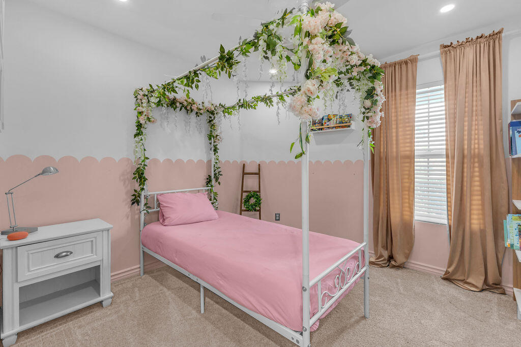 84285 Tramonto Way Indio, CA 92203 - Photo 24 of 63 a bedroom with a bed and a window